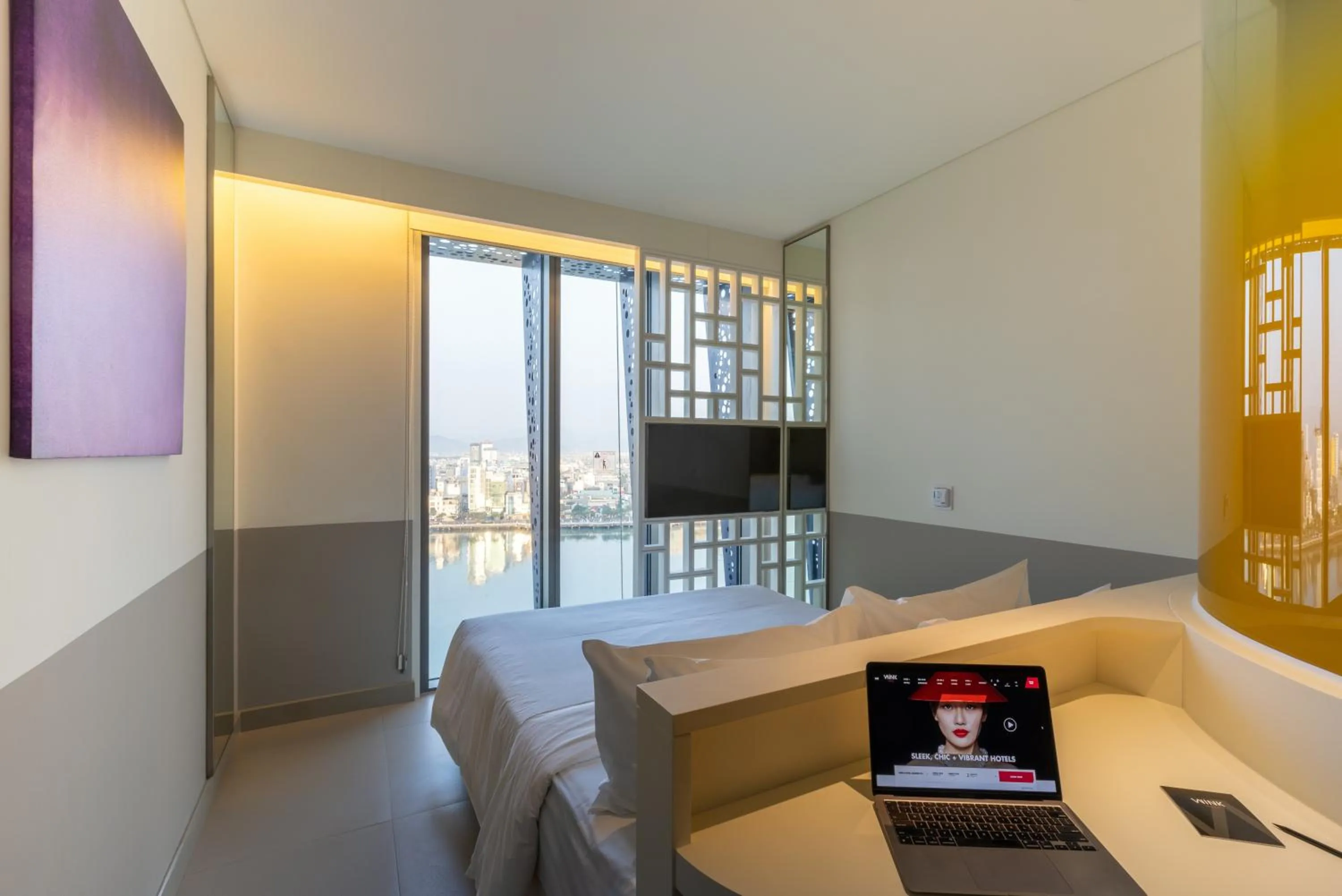 Premier Queen Riverside with Sunset View in Wink Icon Hotel Danang Riverside - 24hrs Stay & Rooftop Pool Bar