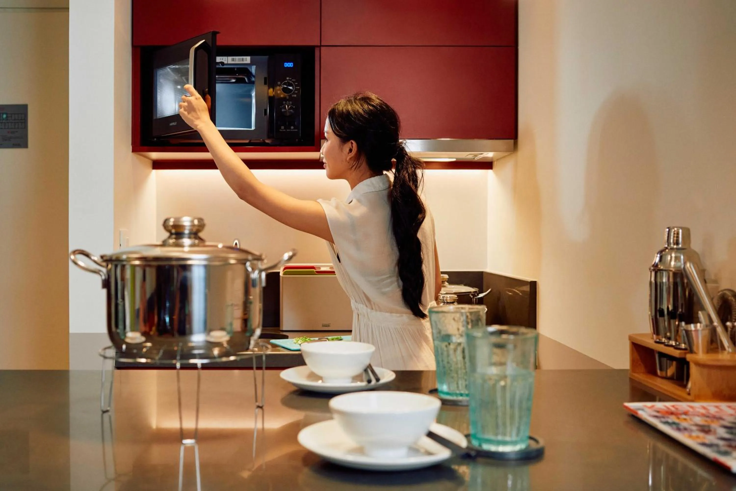 People in Wink Icon Hotel Danang Riverside - 24hrs Stay & Rooftop Pool Bar