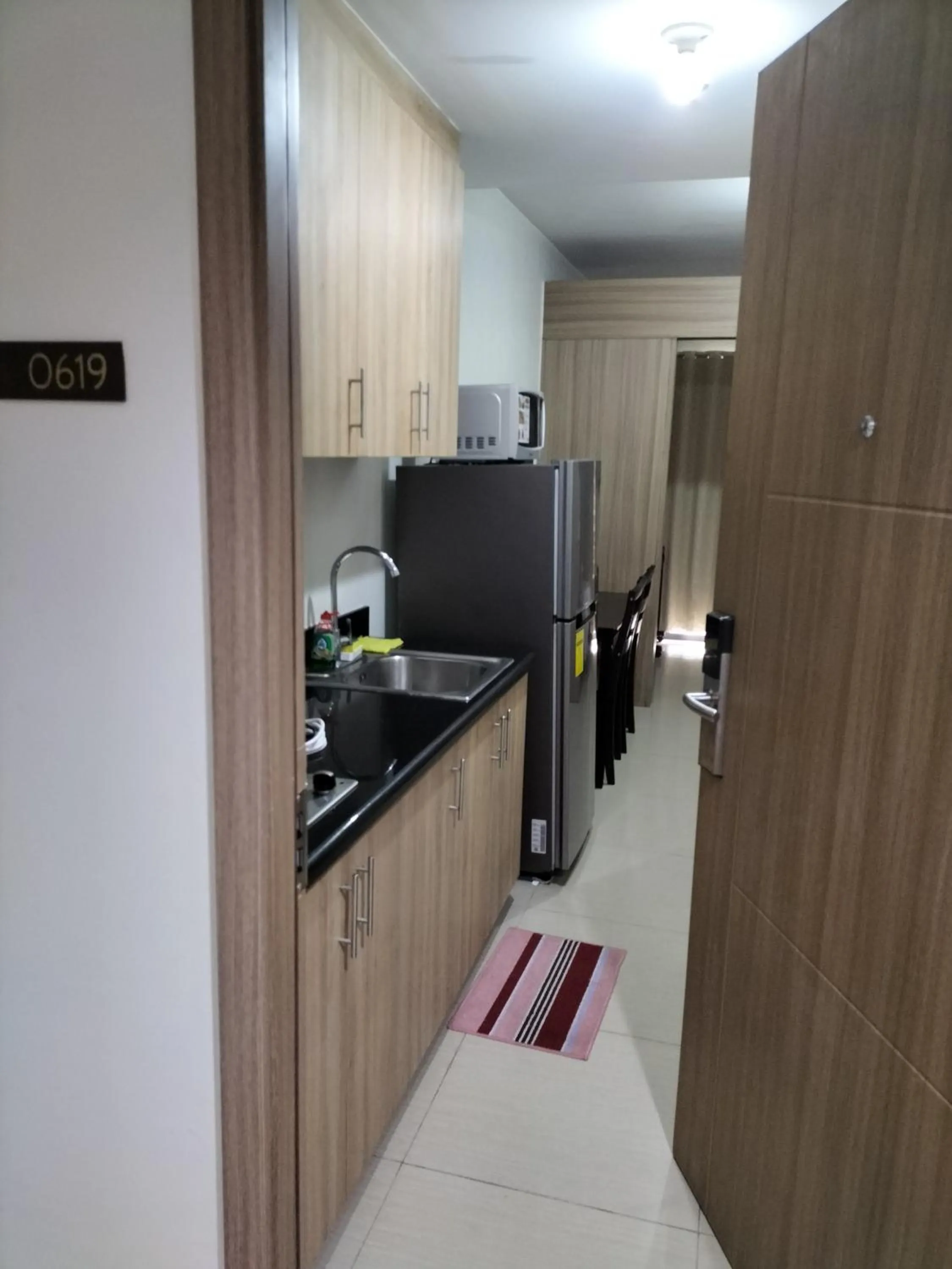 Kitchen or kitchenette in Cozy22 1BR at Shore2 Tower2
