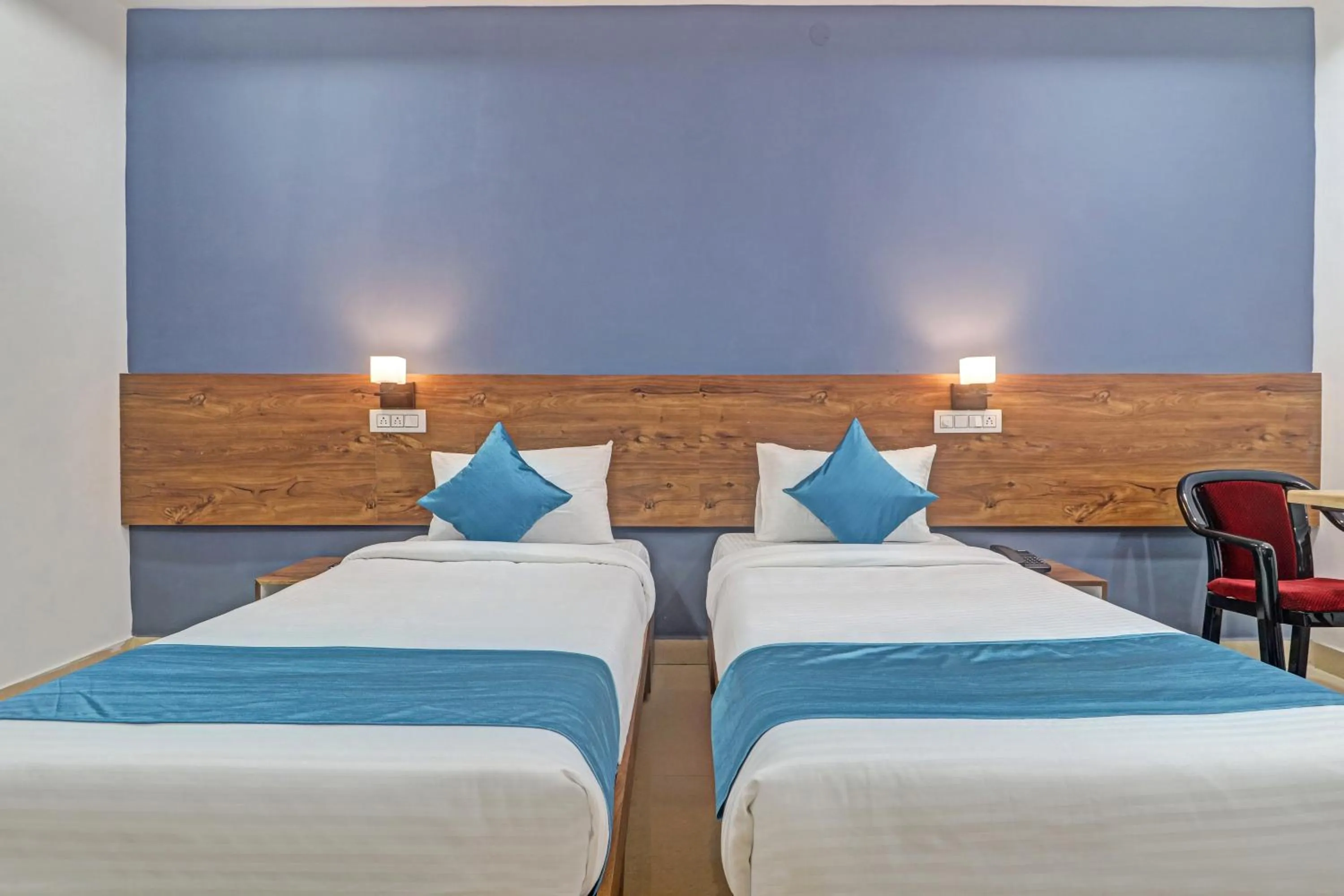 Bed in The Balcony Hotel