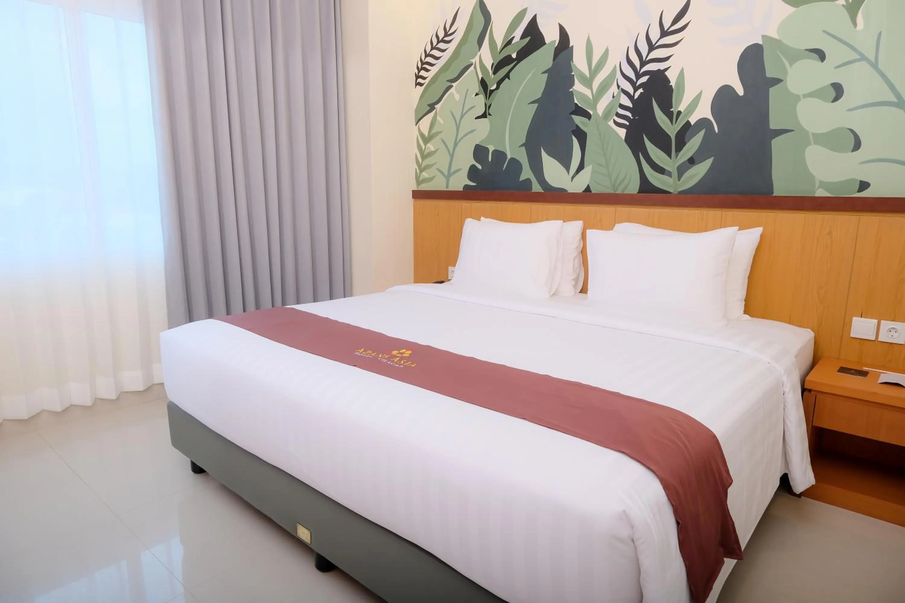 Bedroom, Bed in Azana Asia Hotel Cilacap