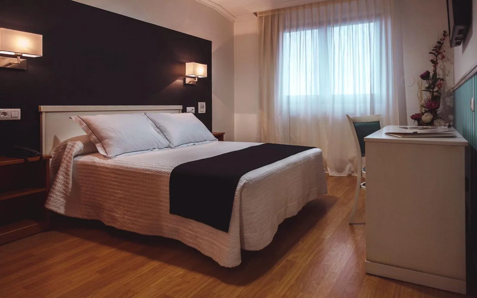 Bed in Hotel Lombiña