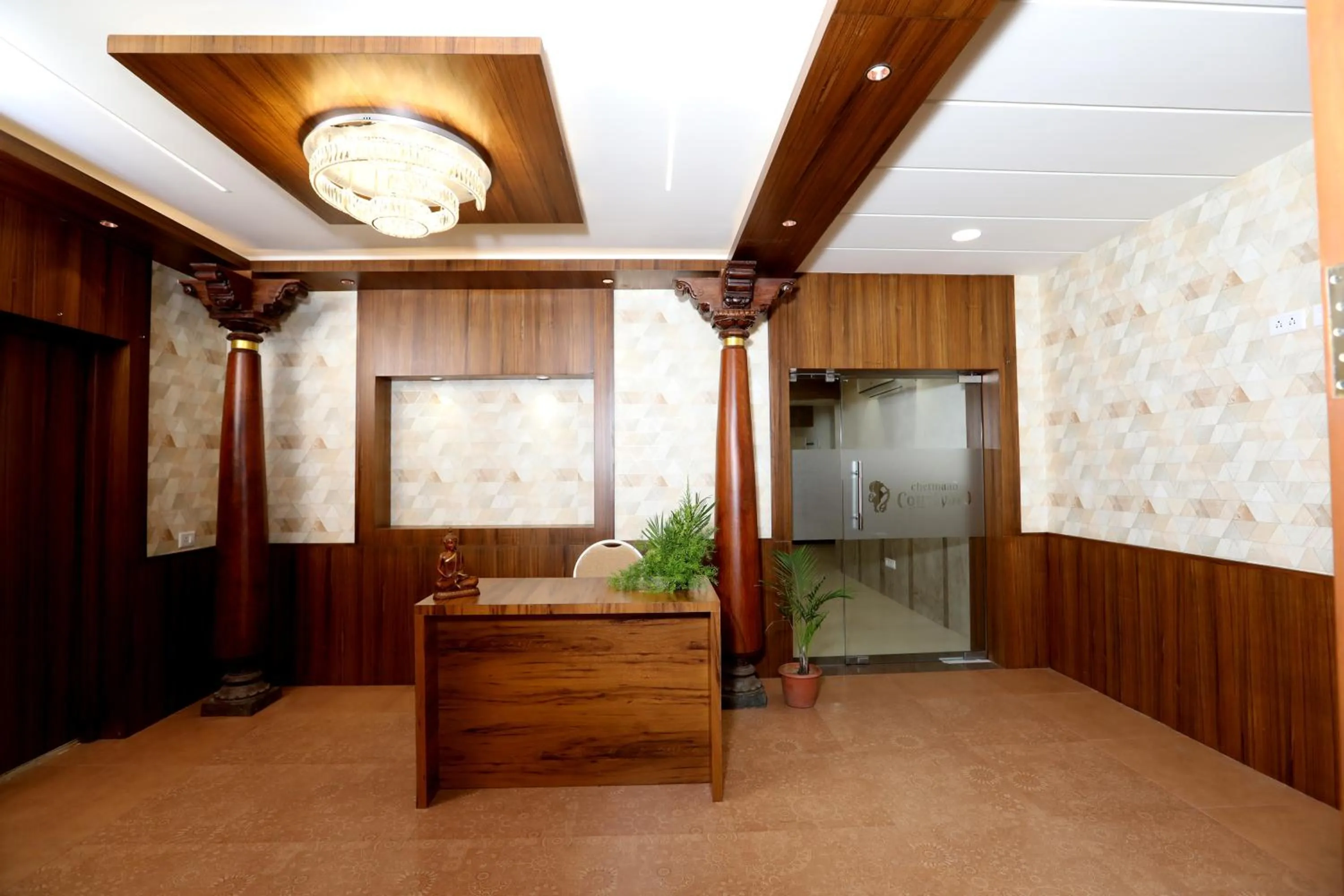 Facade/entrance in Chetinaad Courtyard Gandhipuram by Centre Park