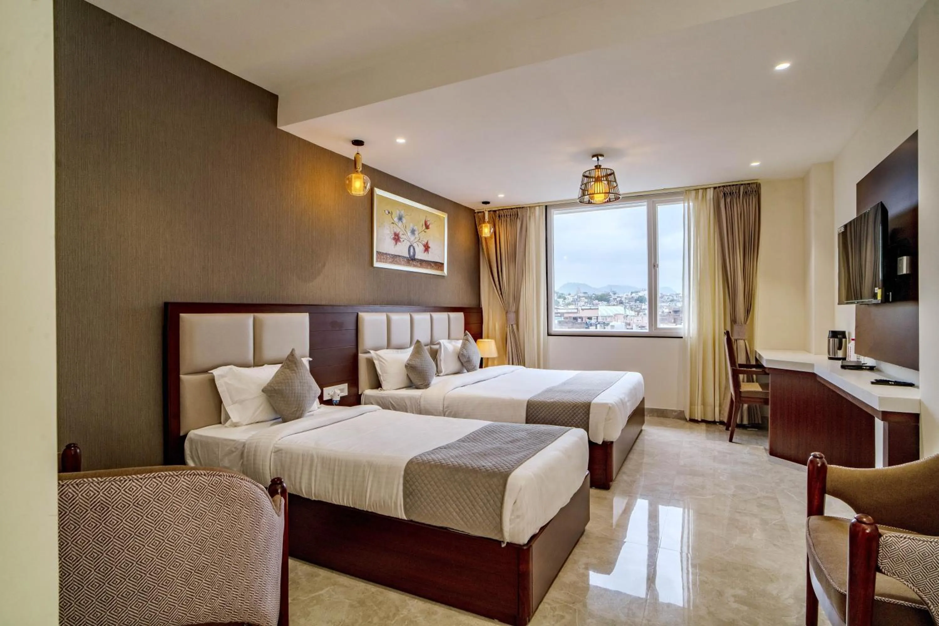 Bed in THE MANGAL VIEW RESIDENCY - A Luxury Boutique Business Hotel