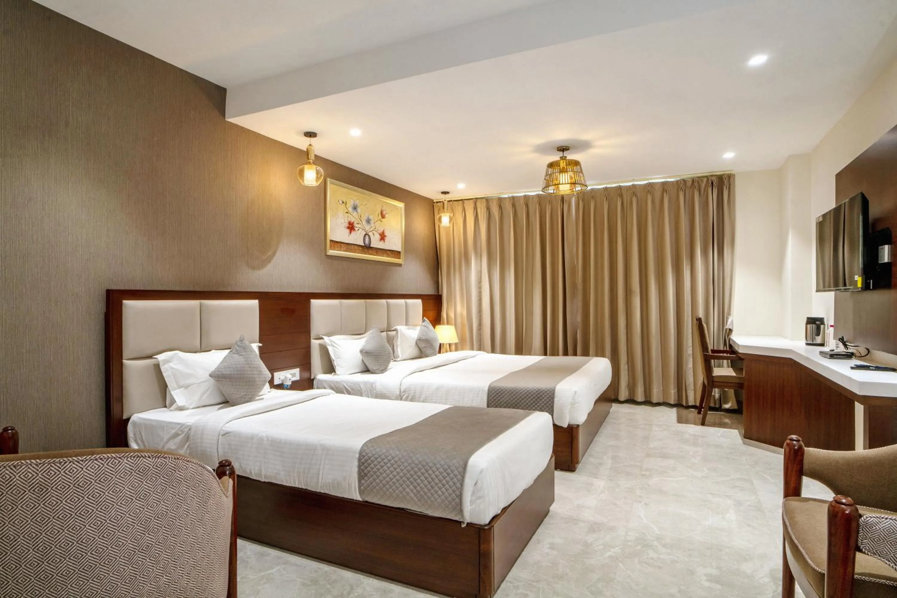 Bed in THE MANGAL VIEW RESIDENCY - A Luxury Boutique Business Hotel
