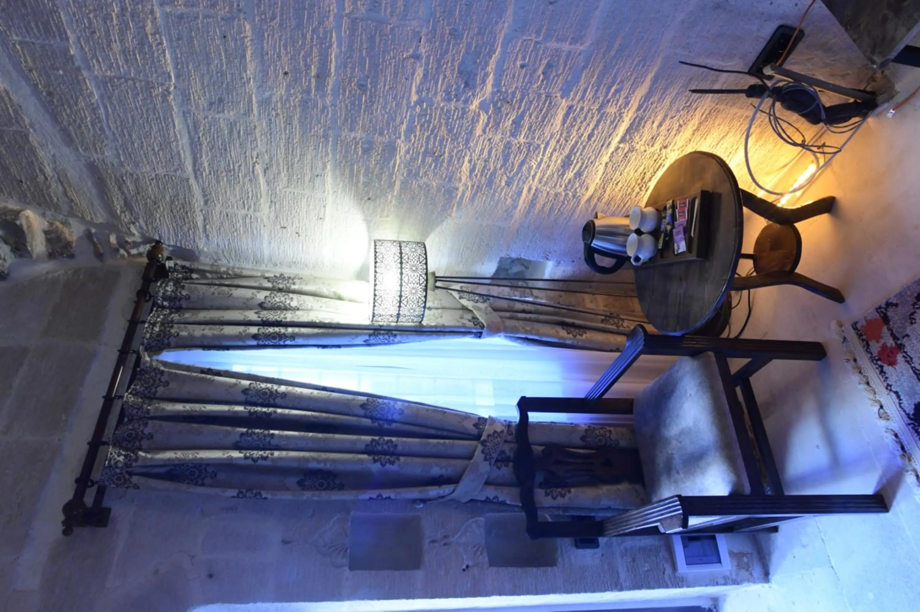 Bed in Legacy Mesopotamia Hotel