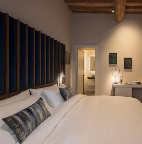 Bed in Times Suites - Guesthouse