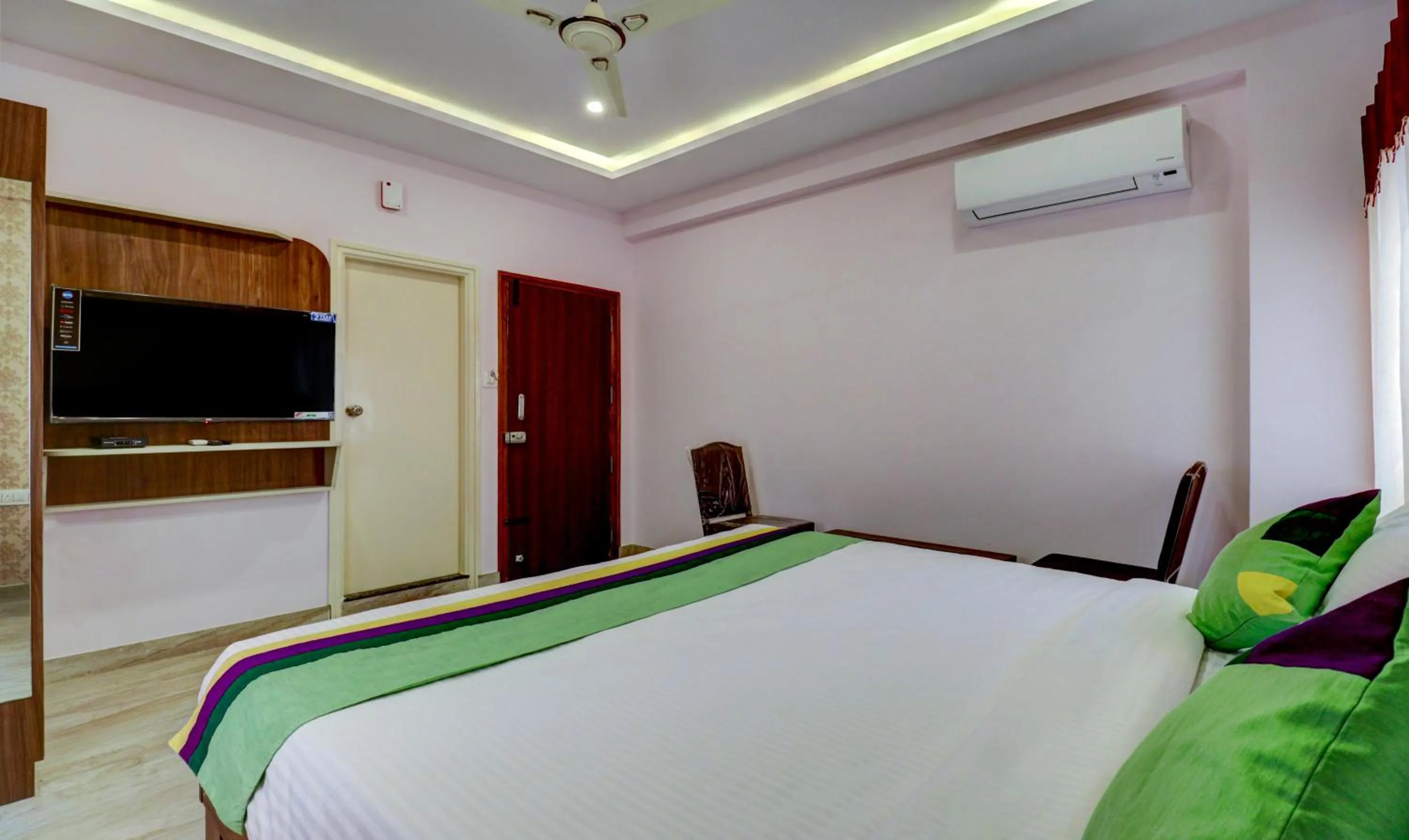 Bedroom, Bed in Treebo Three Street Inn