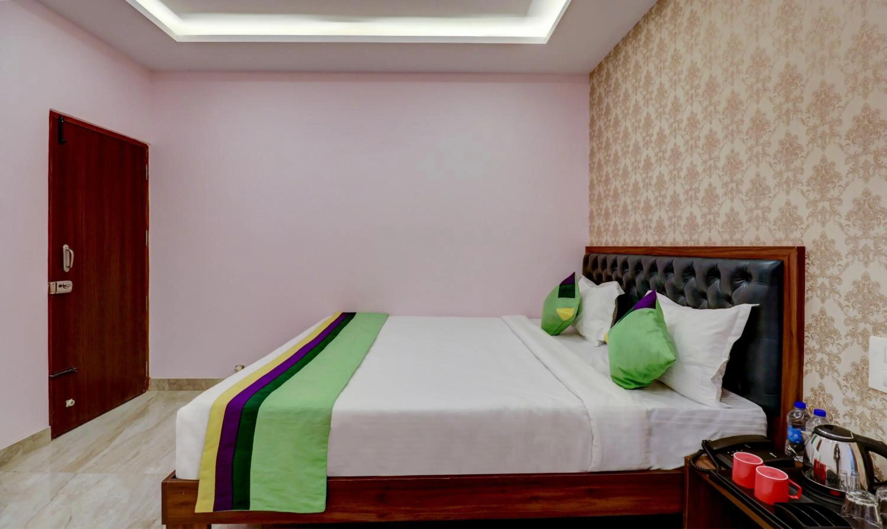 Bedroom, Bed in Treebo Three Street Inn