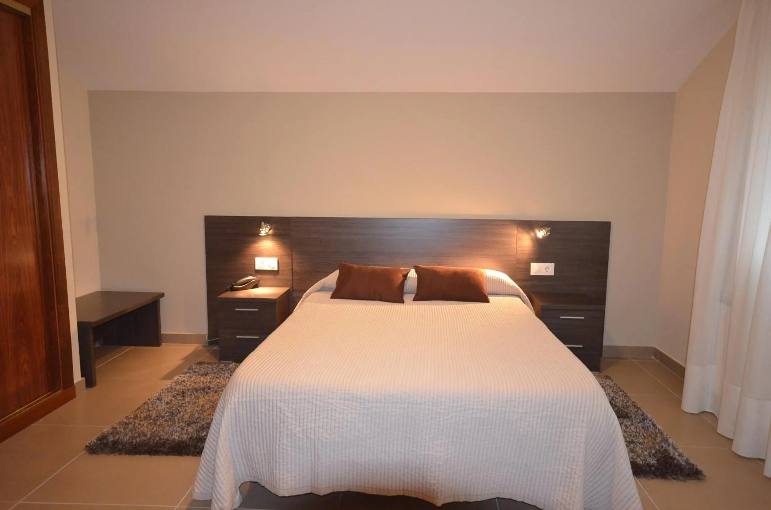 Photo of the whole room, Bed in Hotel Susuqui