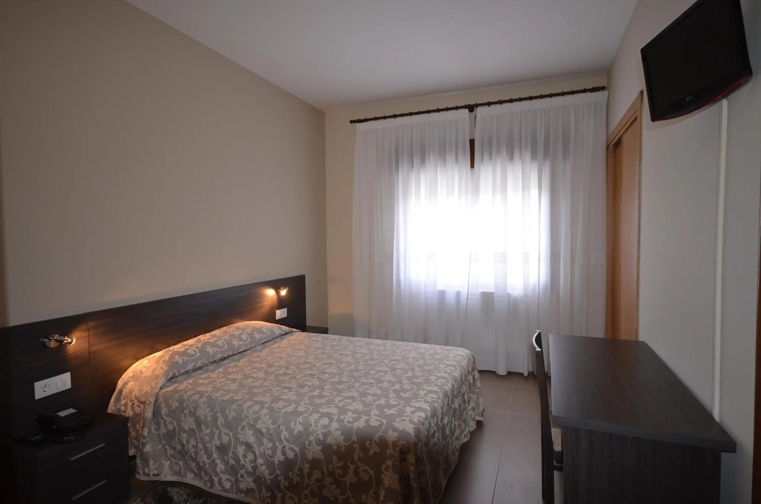 Bedroom, Bed in Hotel Susuqui