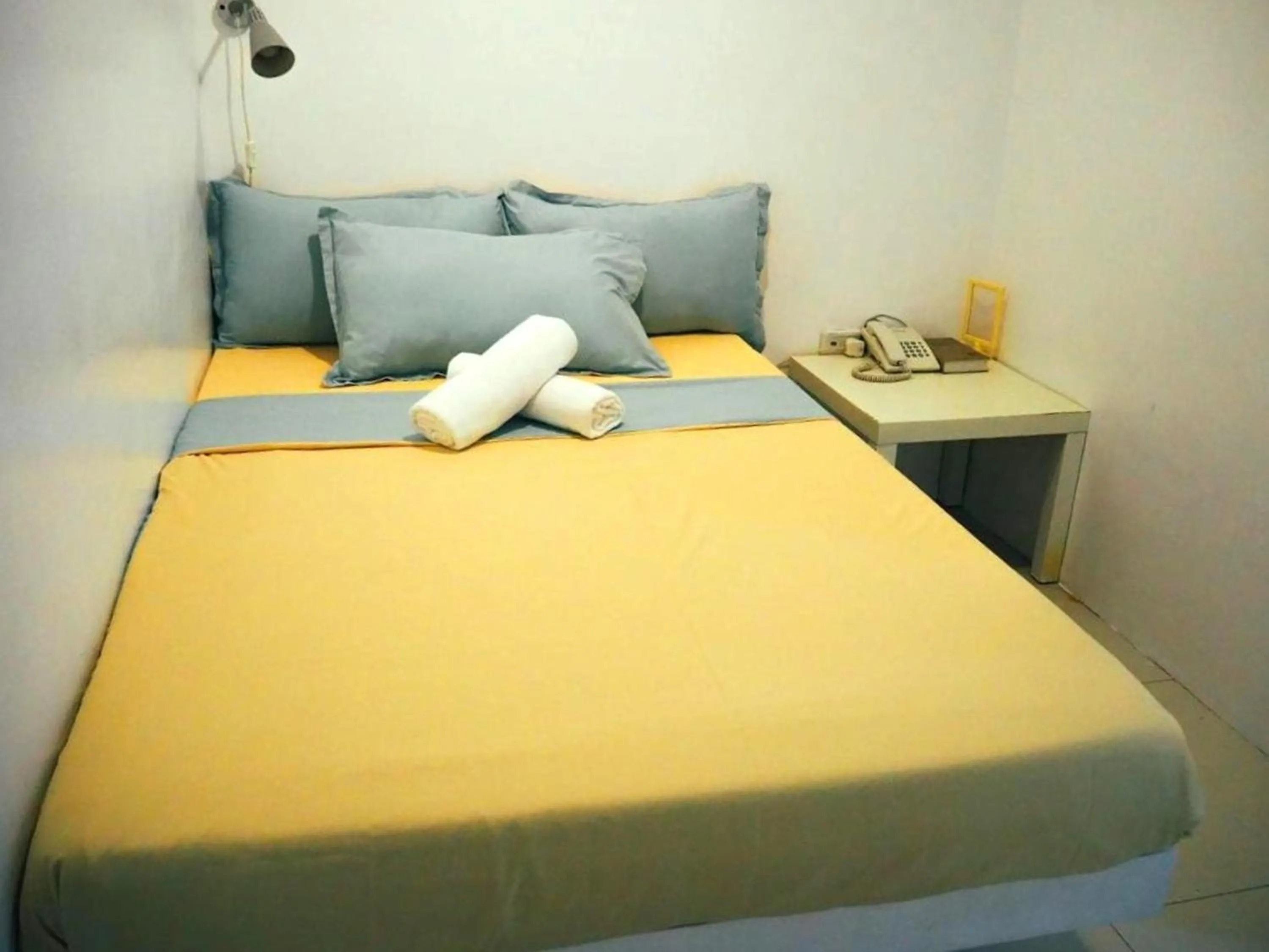 Bed in Wanderlust Bed and Breakfast Puerto Princesa