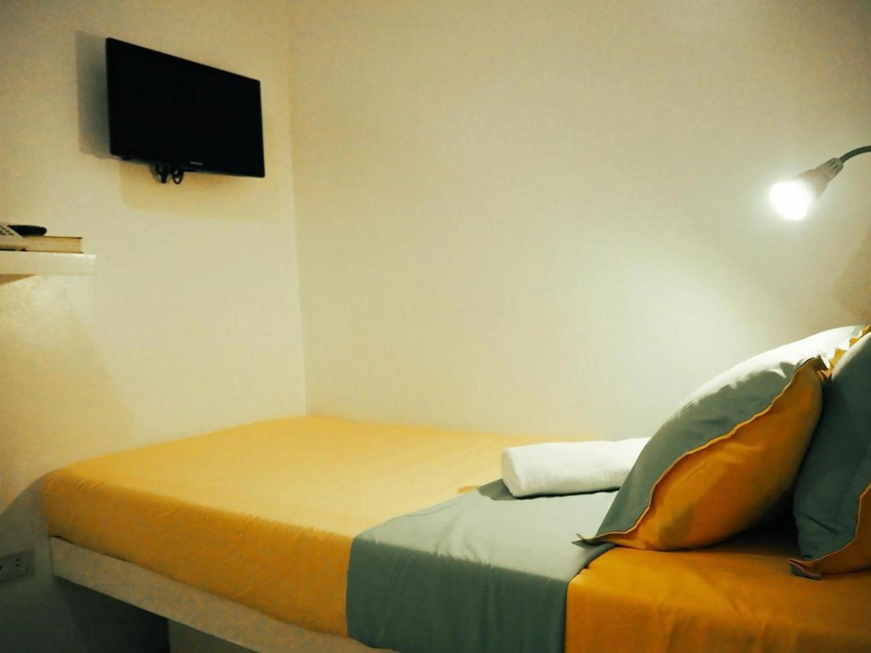Bed in Wanderlust Bed and Breakfast Puerto Princesa