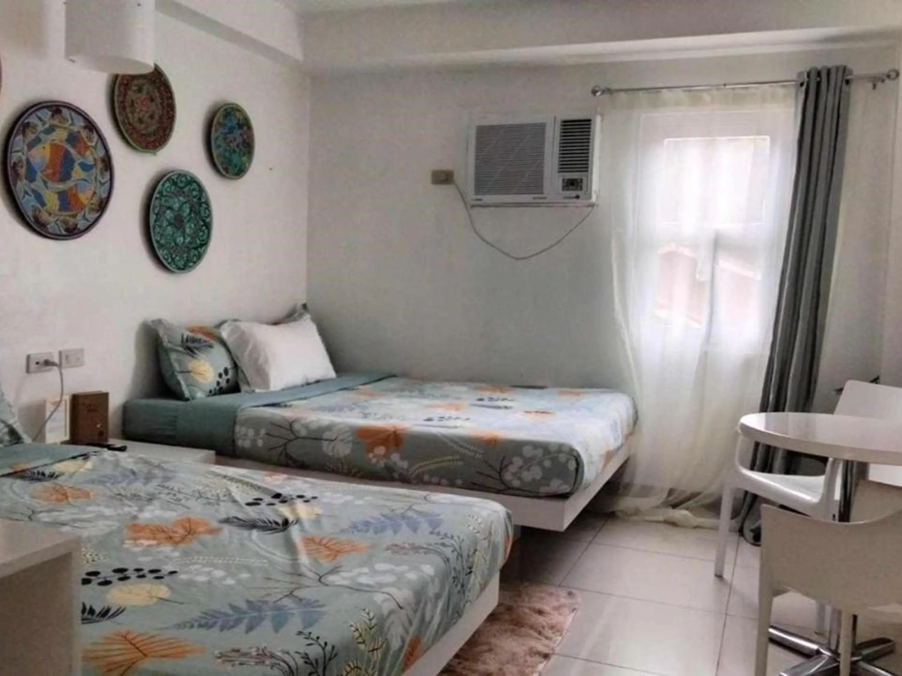 Bed in Wanderlust Bed and Breakfast Puerto Princesa