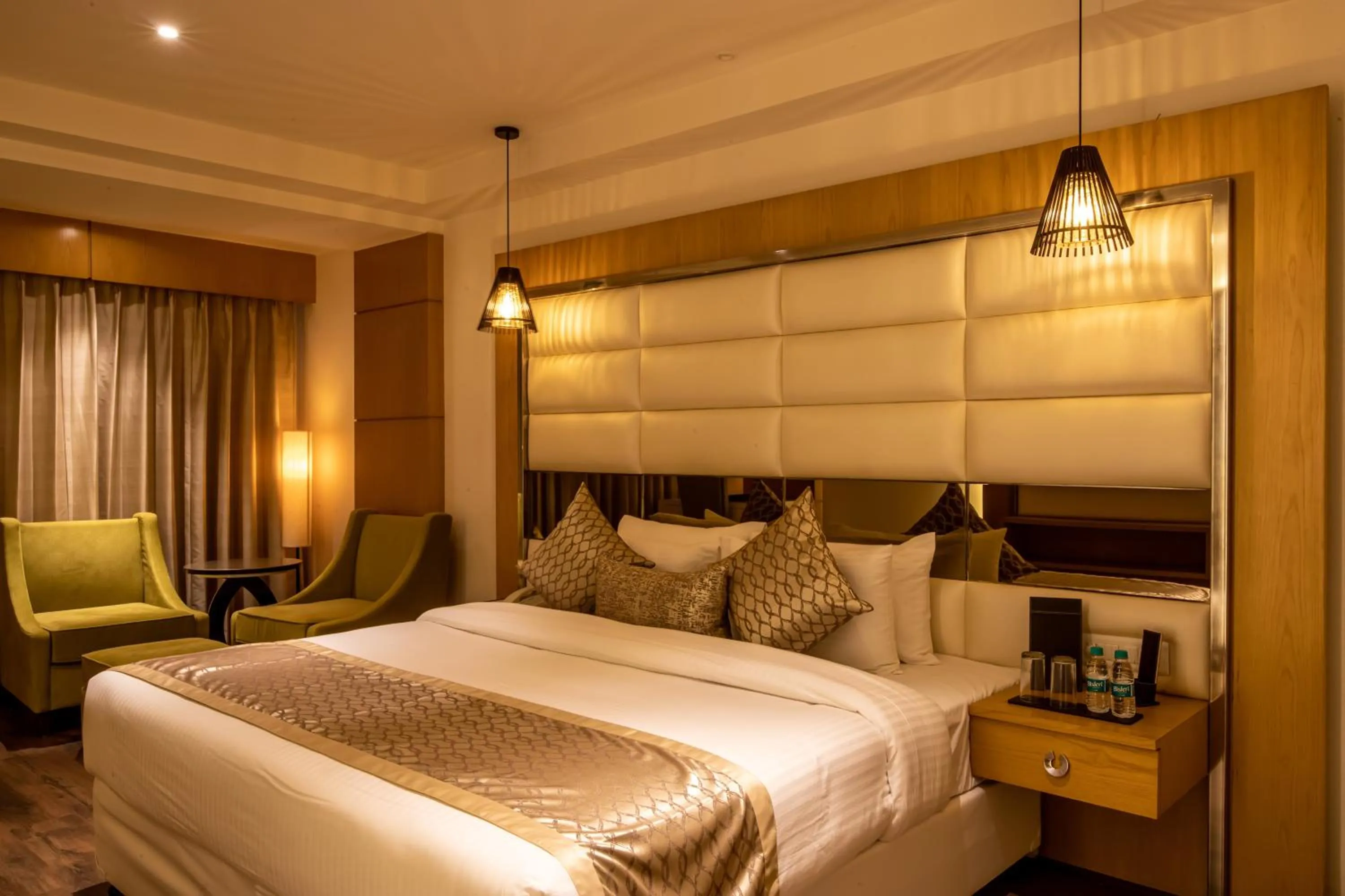 Bed in The Pristine Hotel