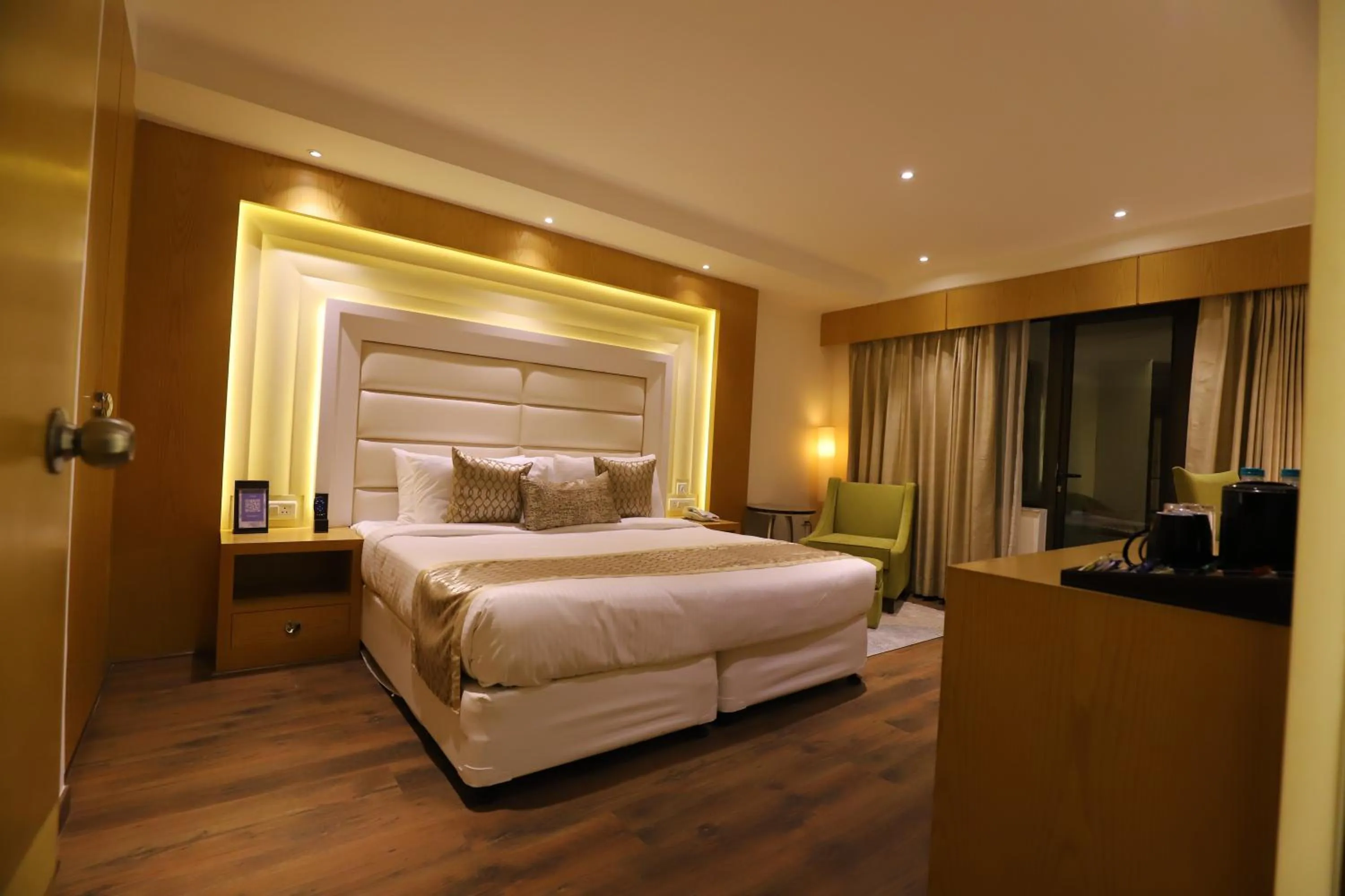 Bed in The Pristine Hotel