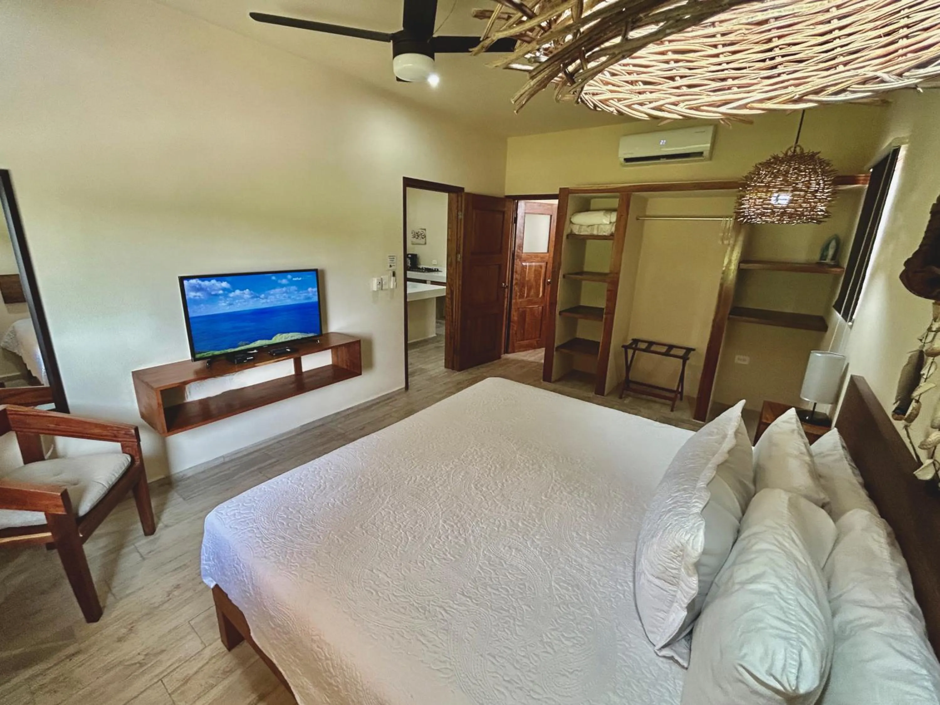 Communal lounge/ TV room, Bed in Aldea Xaan Ha Tulum