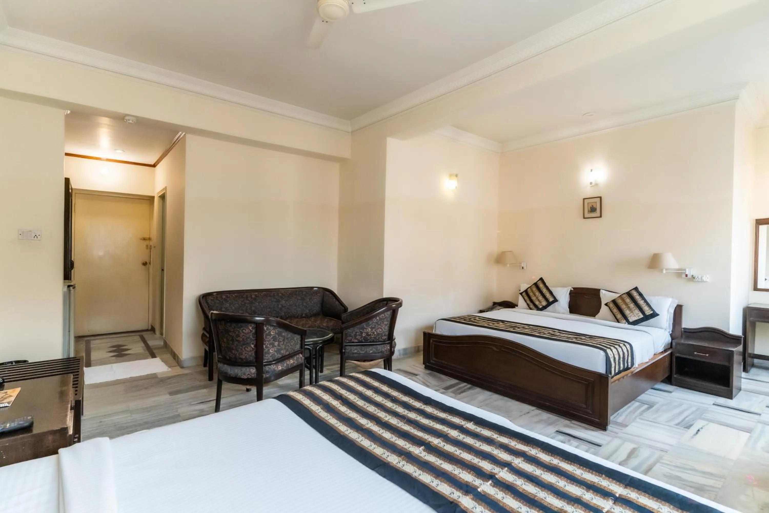 Bed in Hotel Kant Palace