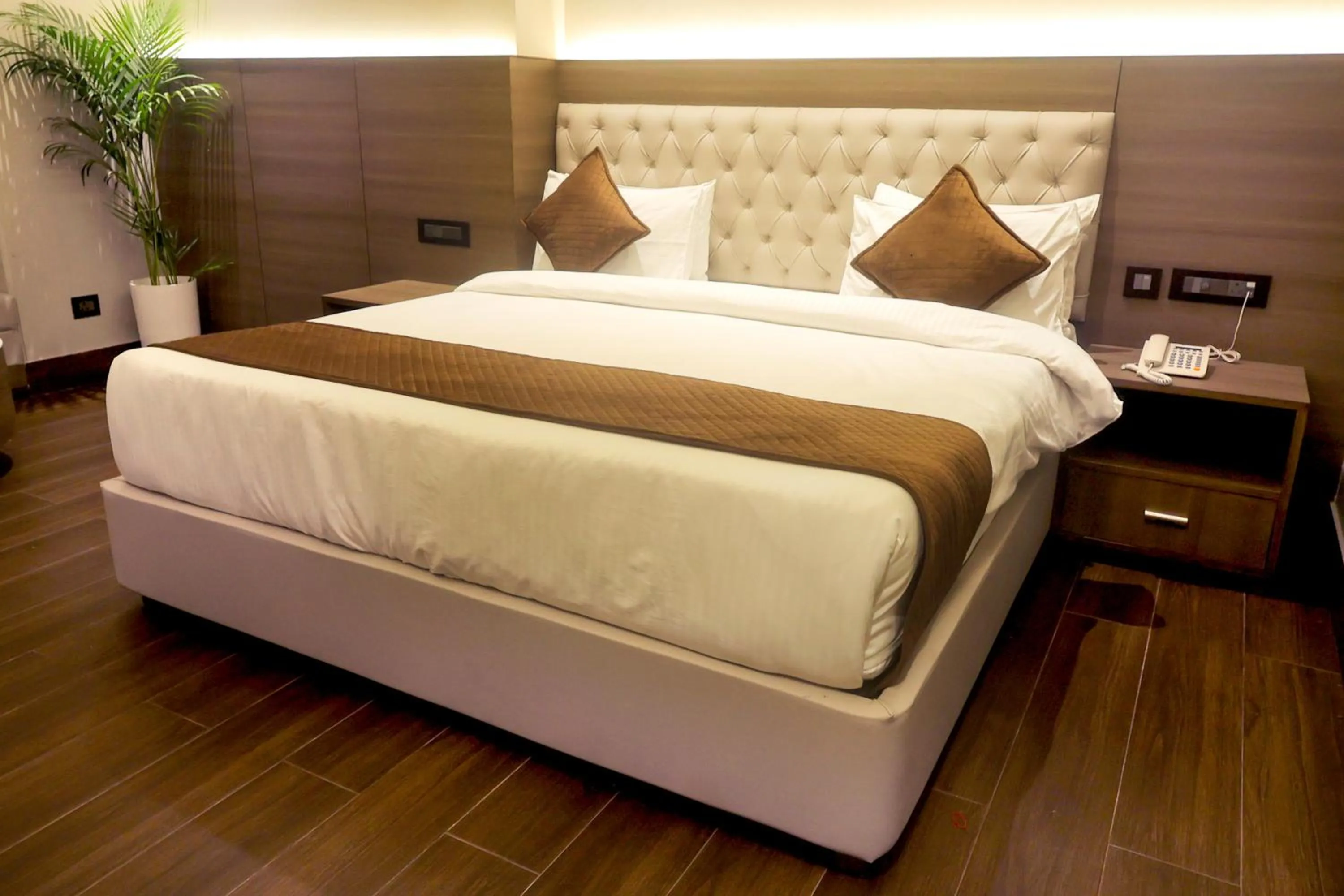 Bed in Hotel Kant Palace