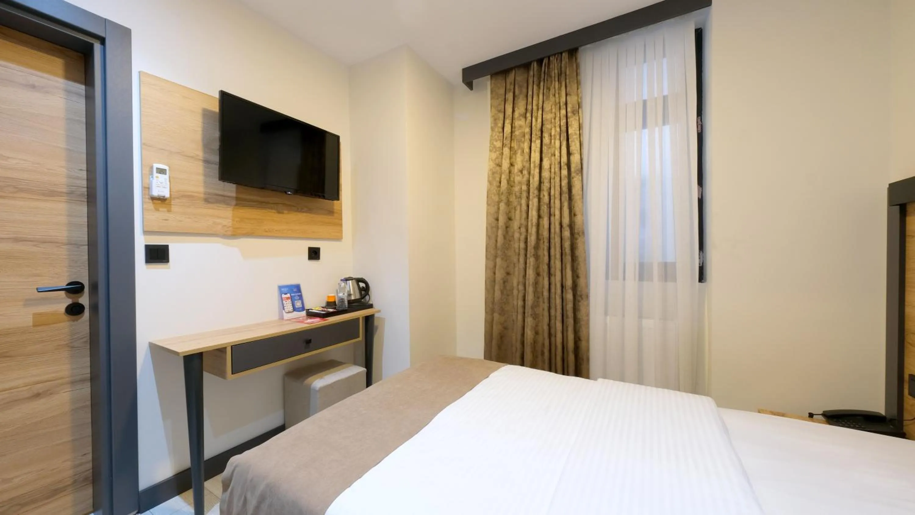 Bed in Sirius Hotel Deluxe