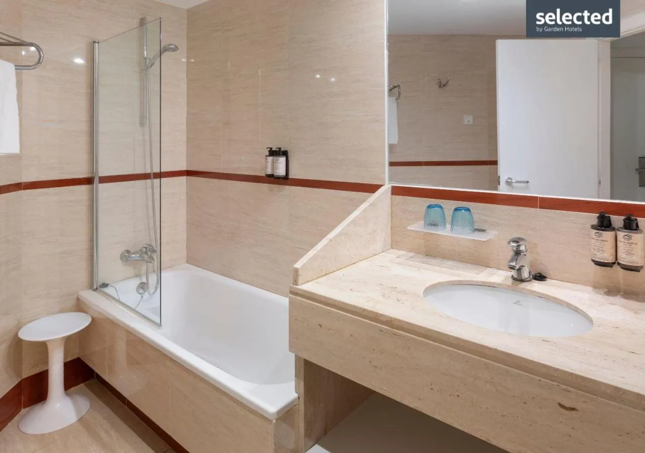 Bathroom in Aparthotel Tropic Garden