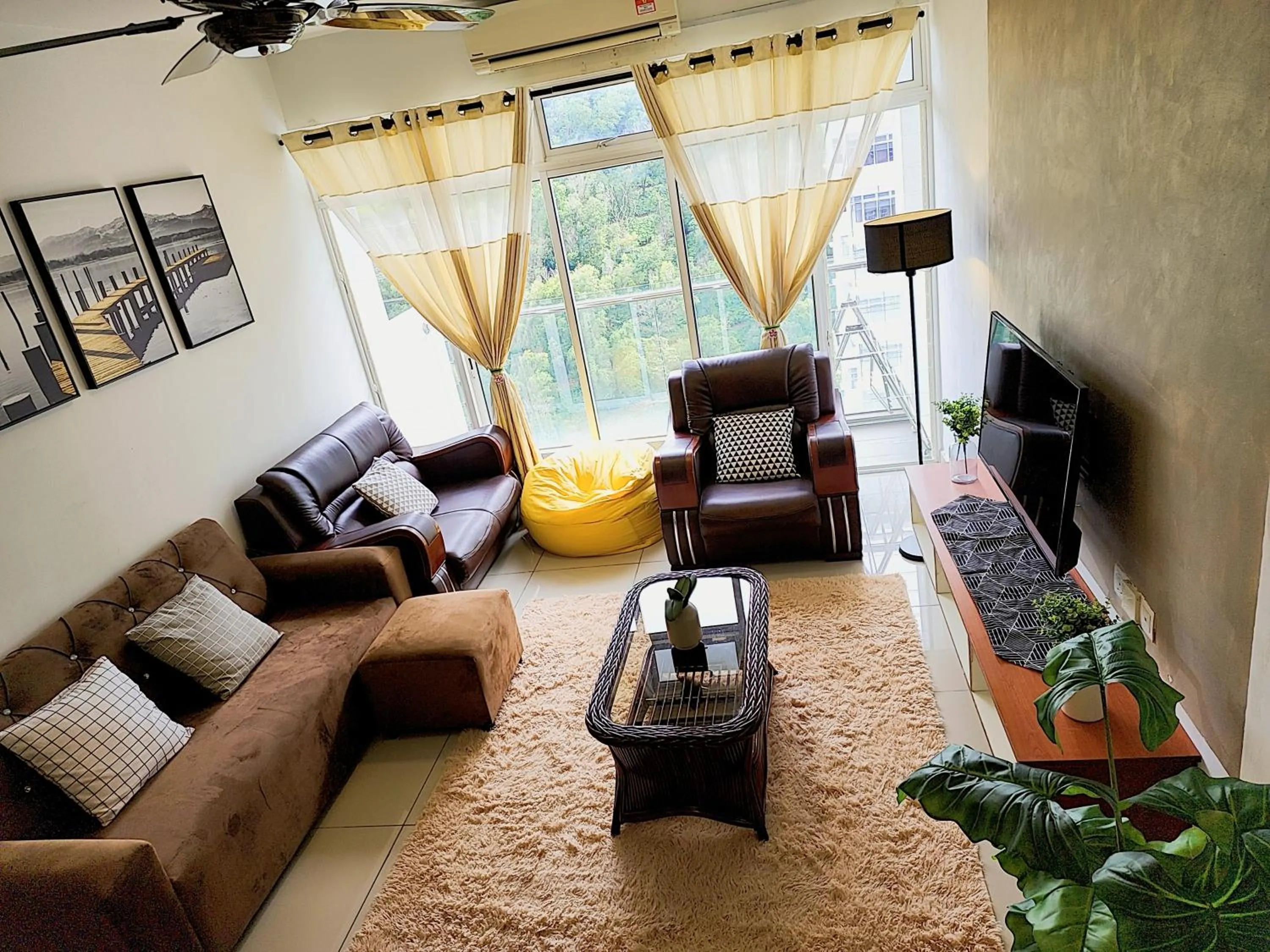 Living room in Putrajaya Dwiputra Residences, Fully Air-Con 3BR Homestay