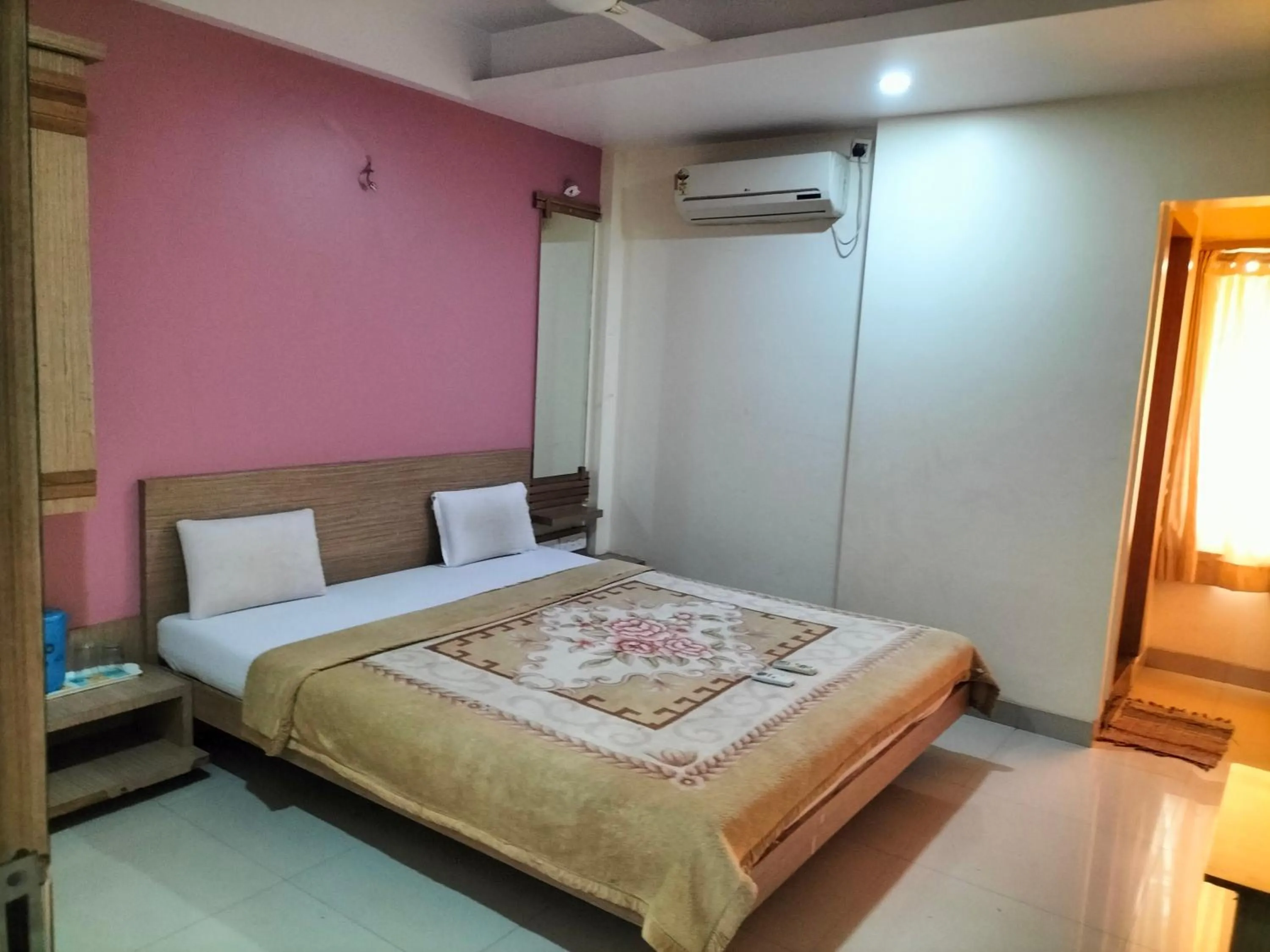 Photo of the whole room, Bed in HOTEL SAI SURYA