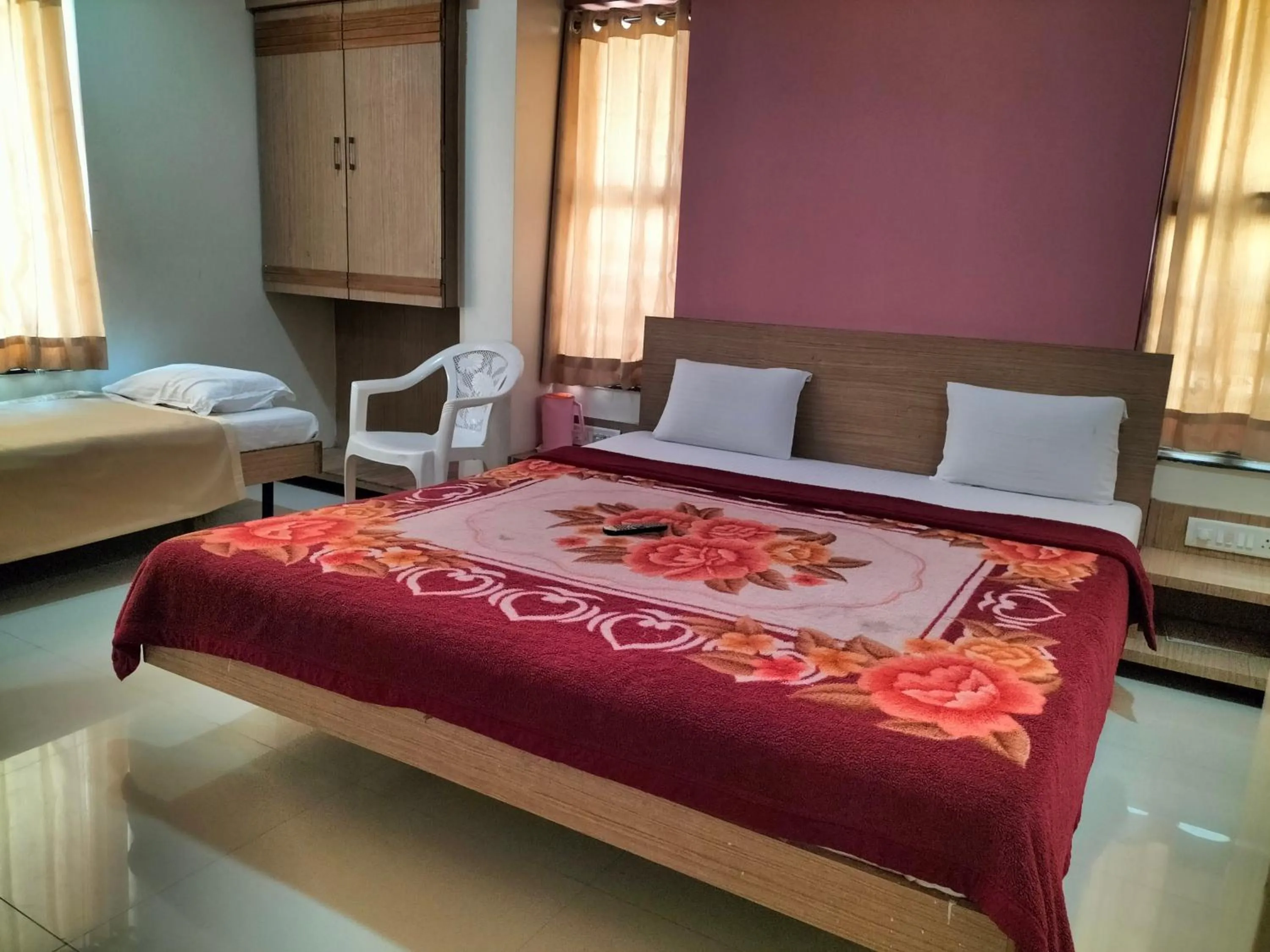 Photo of the whole room, Bed in HOTEL SAI SURYA