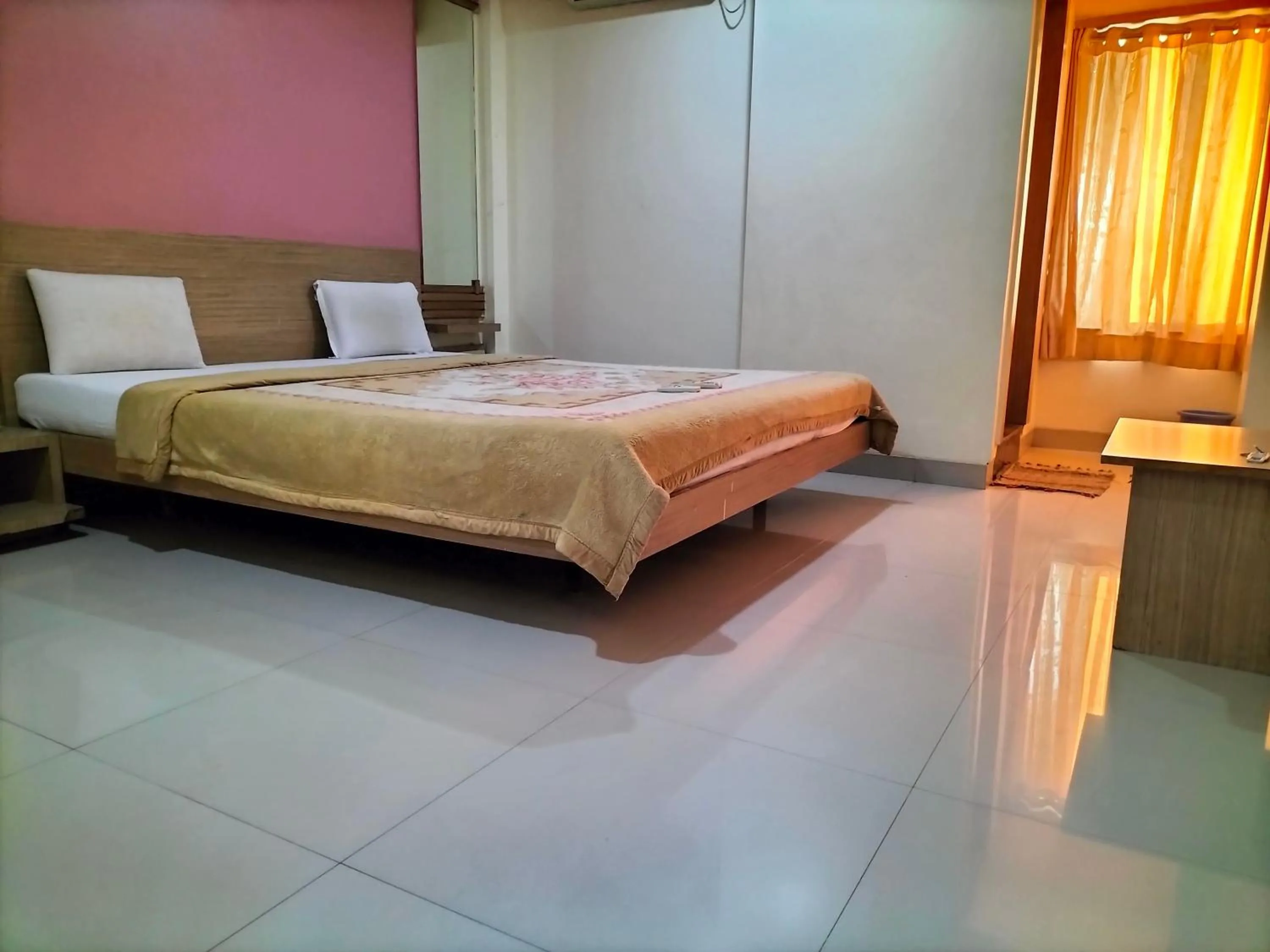 Photo of the whole room, Bed in HOTEL SAI SURYA