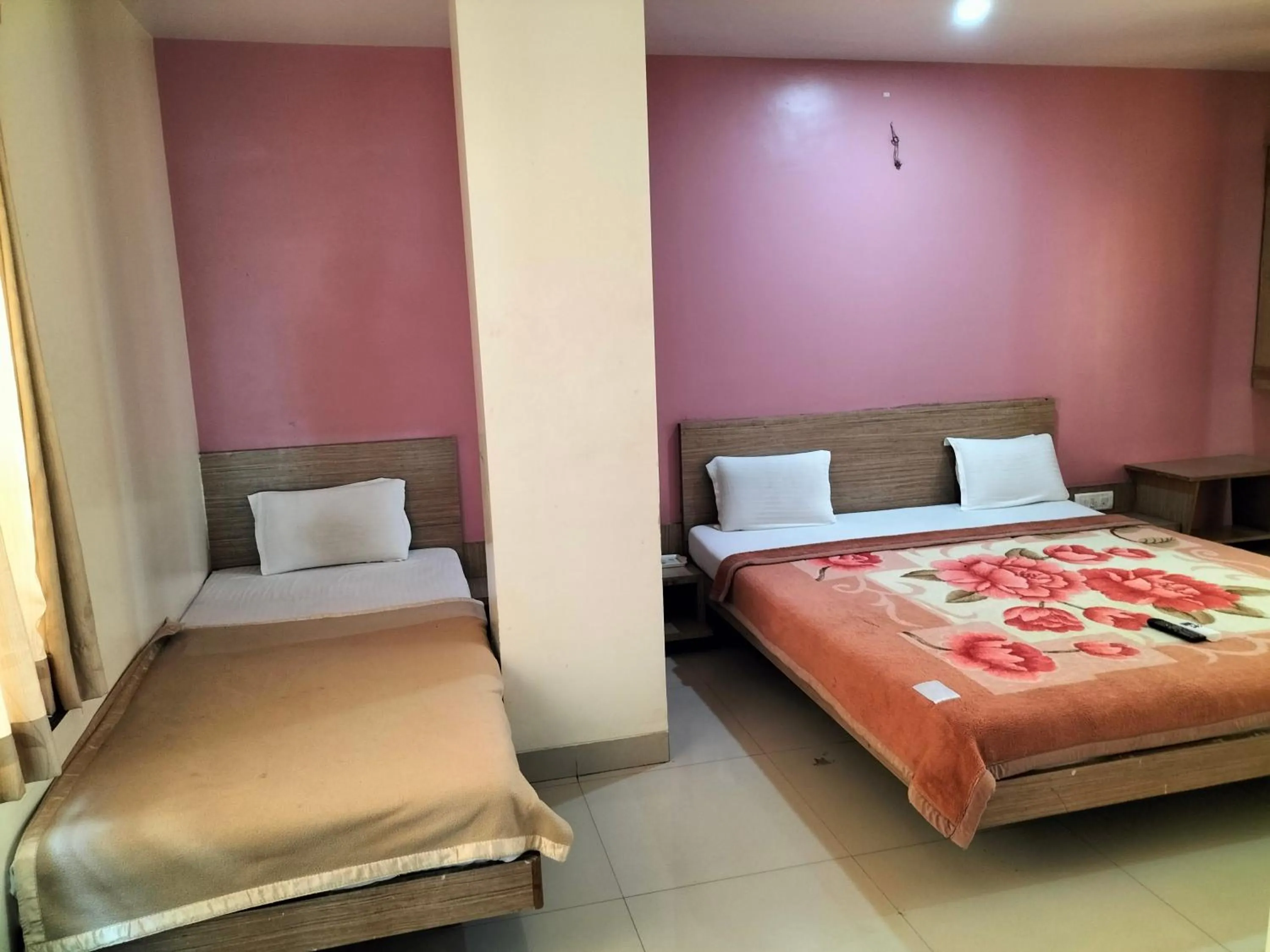 Photo of the whole room, Bed in HOTEL SAI SURYA