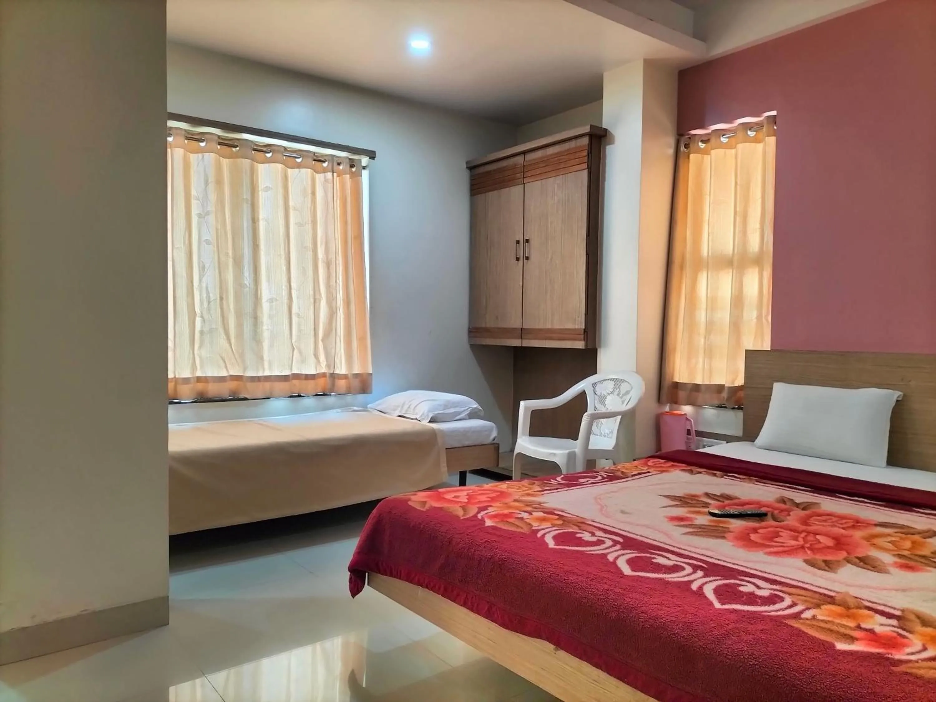 Photo of the whole room, Bed in HOTEL SAI SURYA