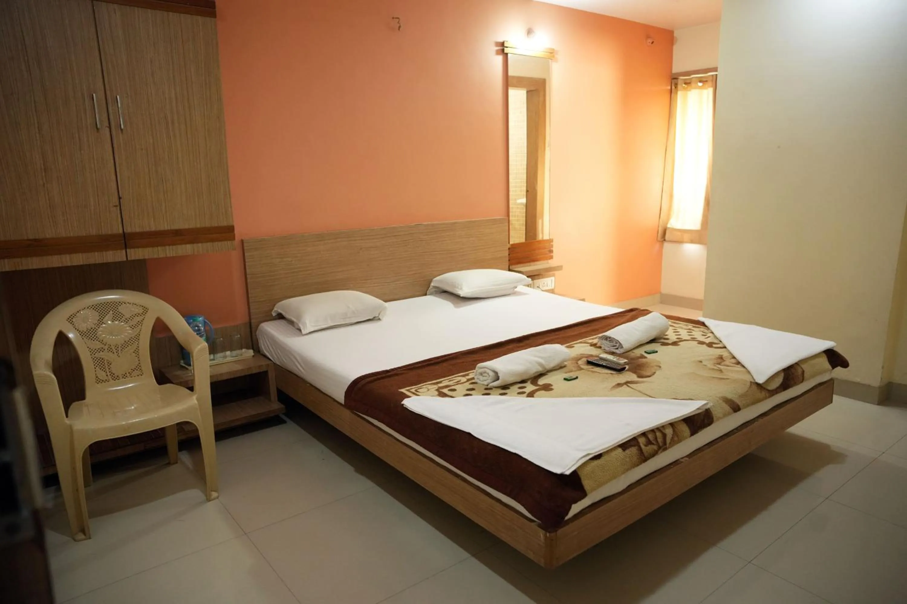 Bed in HOTEL SAI SURYA