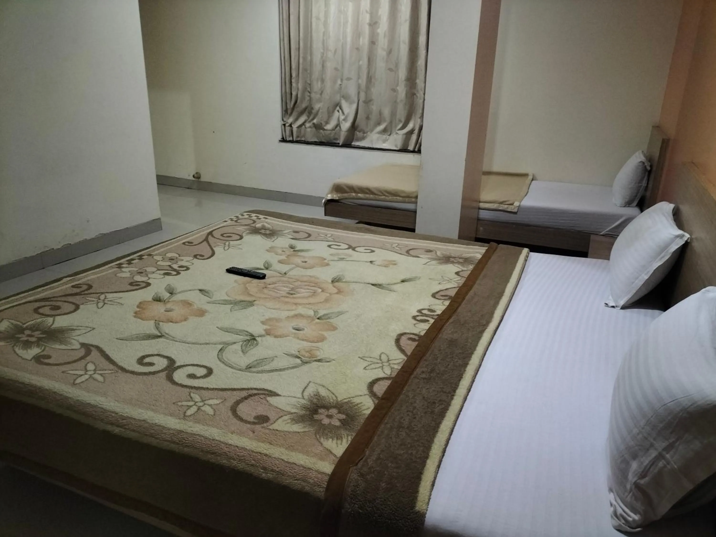 Photo of the whole room, Bed in HOTEL SAI SURYA