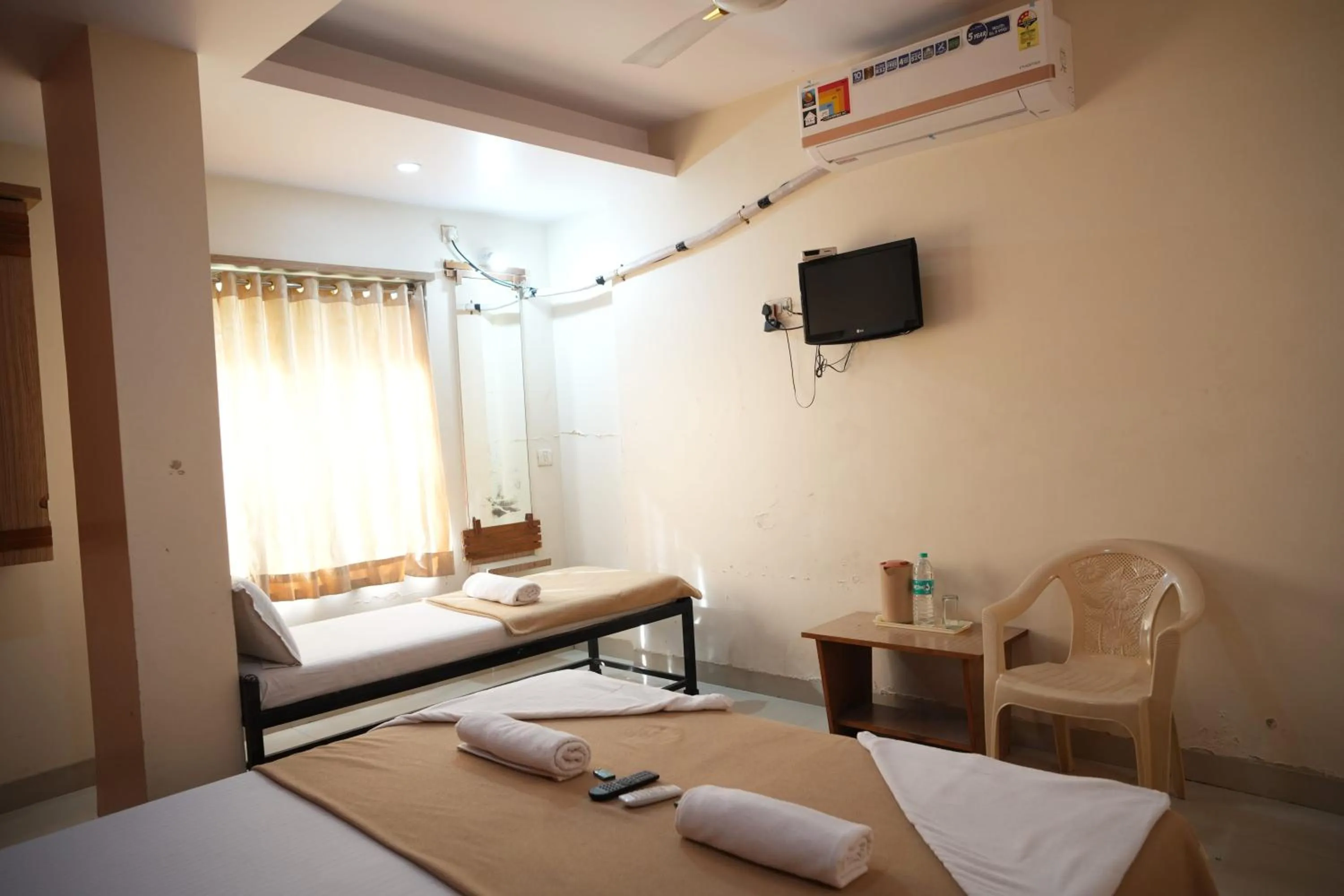 Bed in HOTEL SAI SURYA