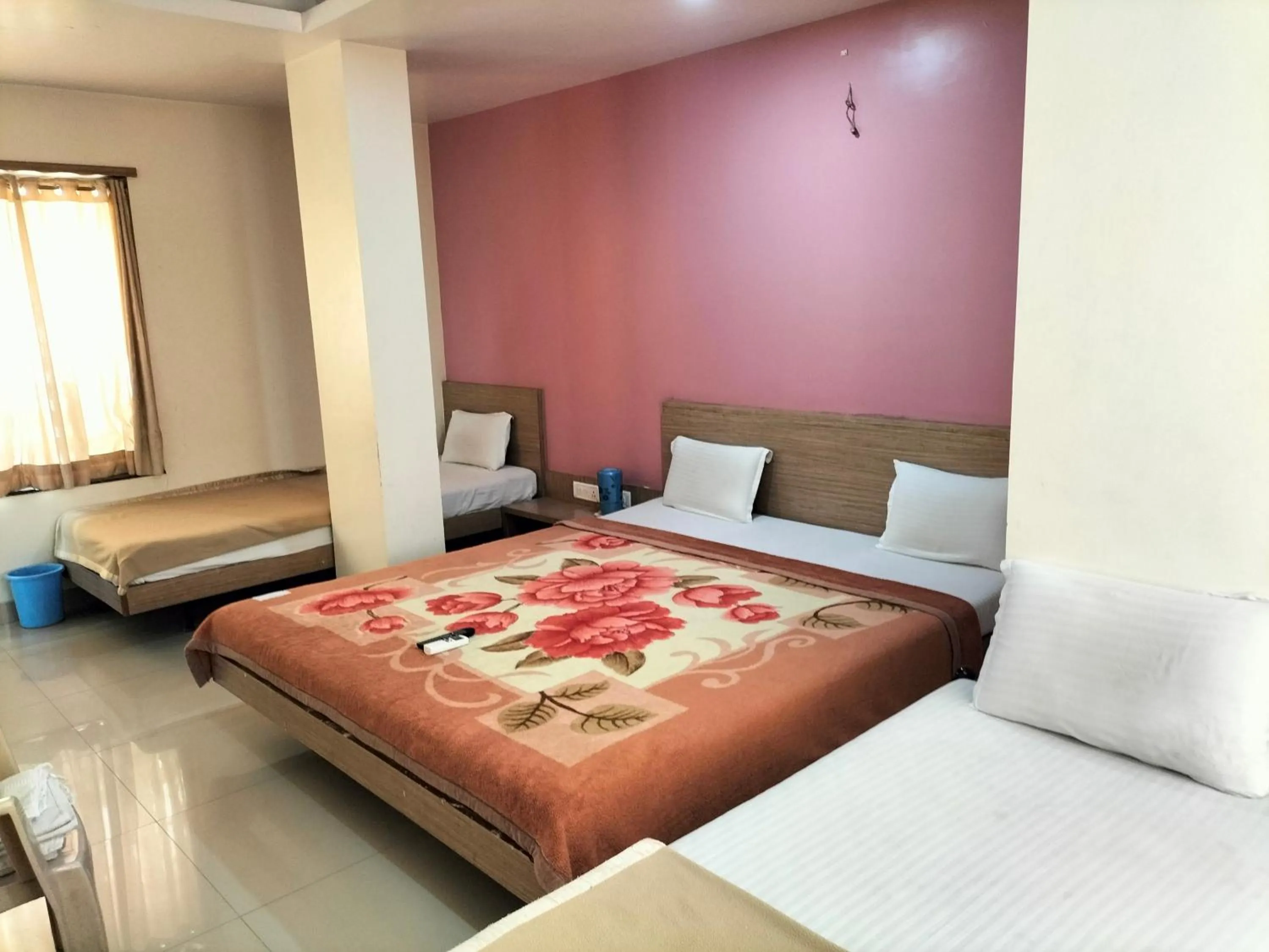 Photo of the whole room, Bed in HOTEL SAI SURYA