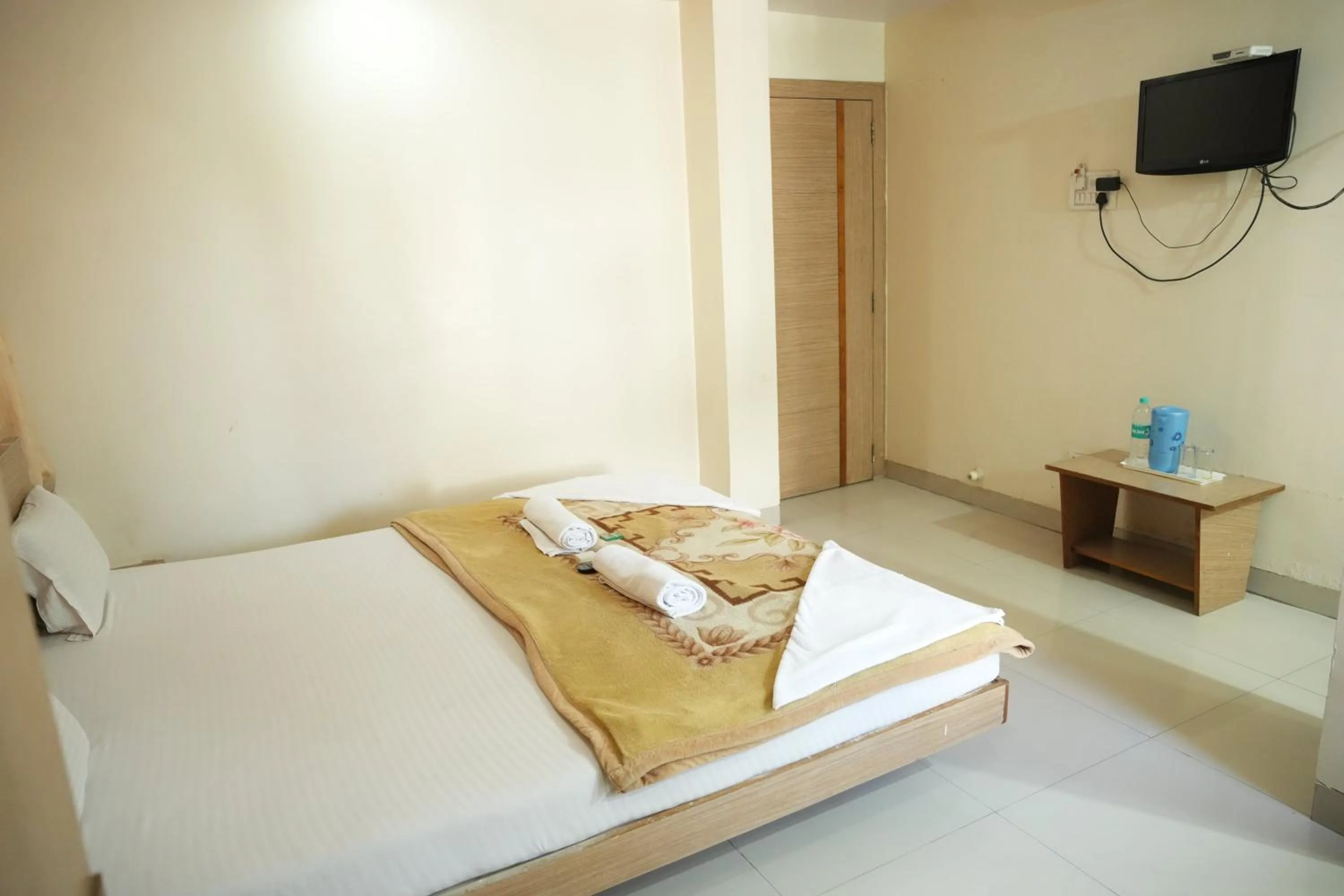 Bed in HOTEL SAI SURYA