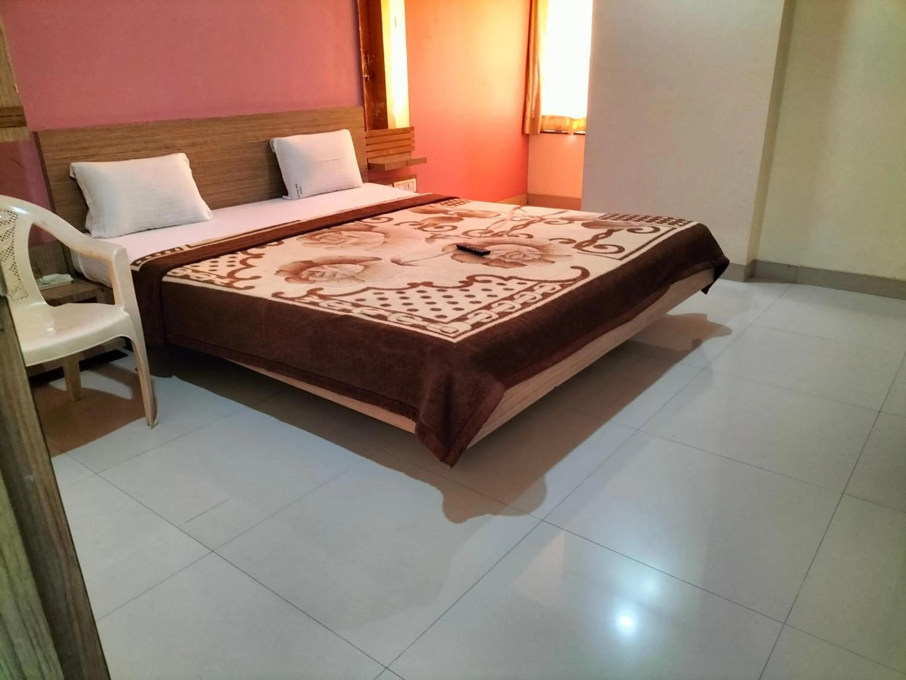 Photo of the whole room, Bed in HOTEL SAI SURYA