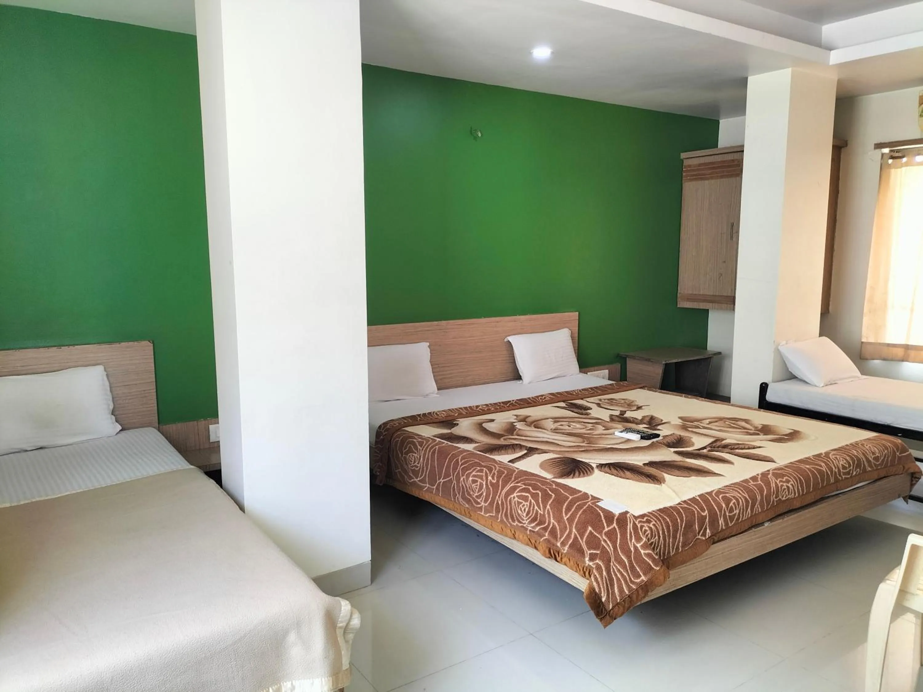 Photo of the whole room, Bed in HOTEL SAI SURYA