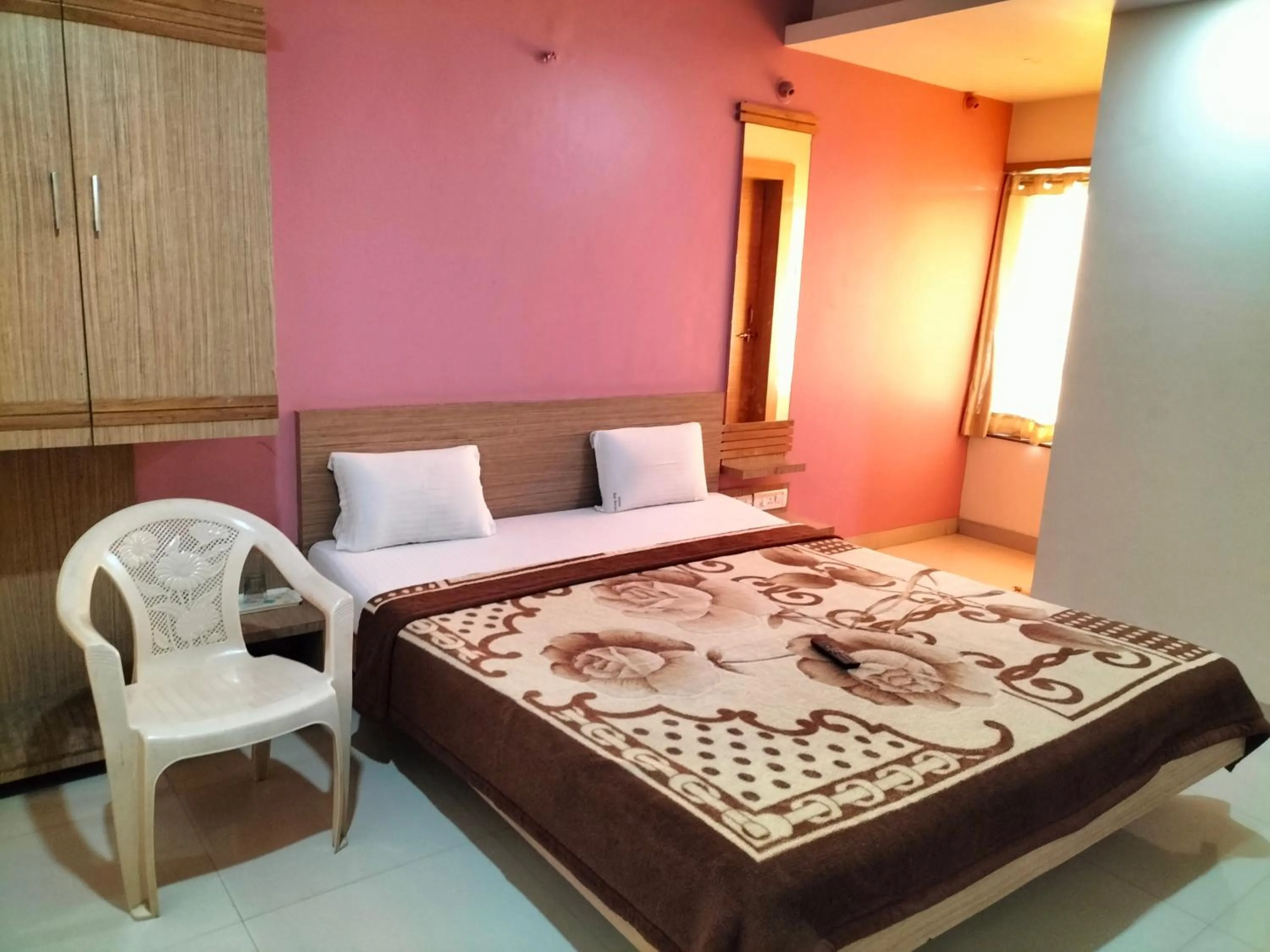 Photo of the whole room, Bed in HOTEL SAI SURYA