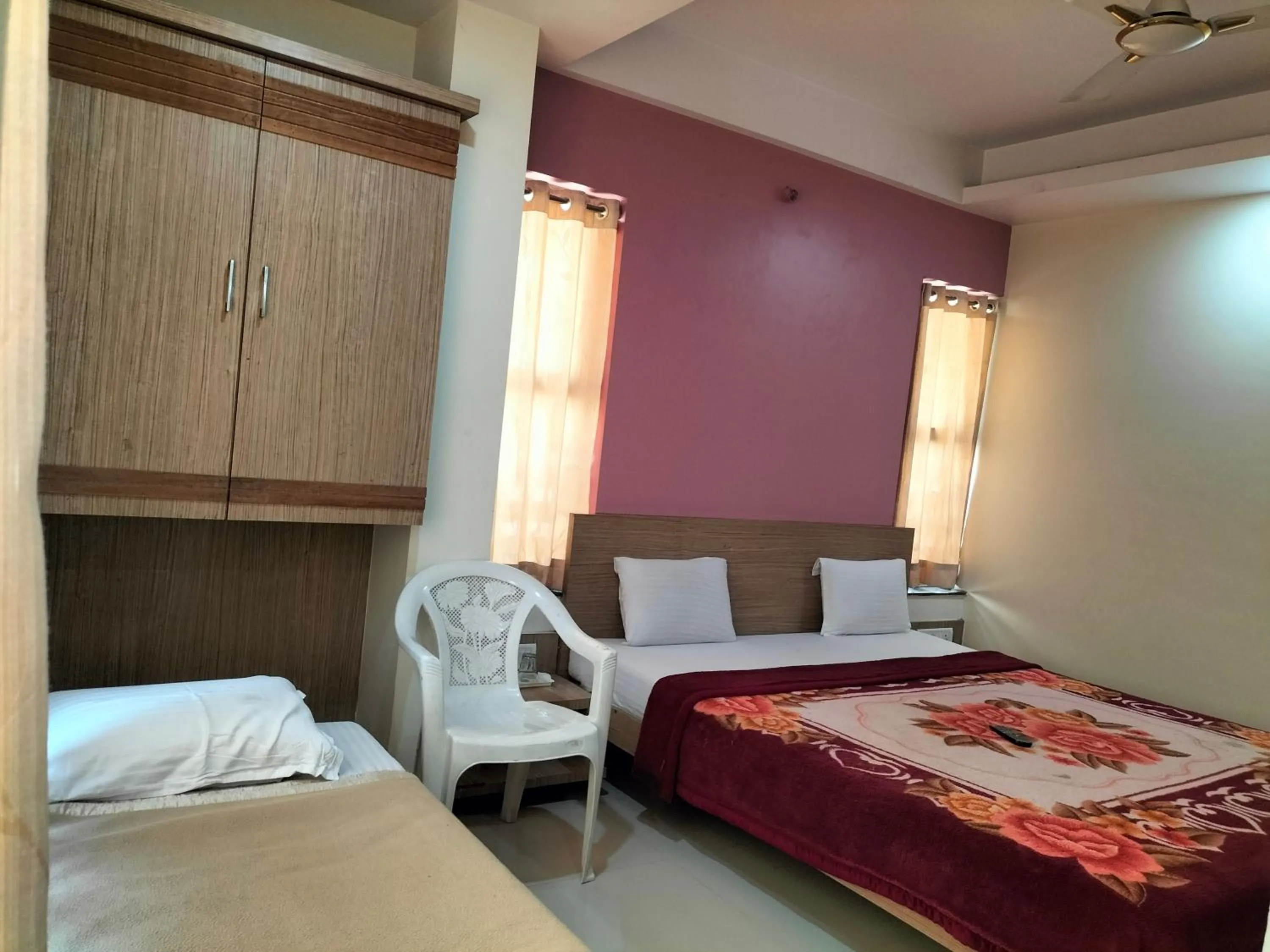 Photo of the whole room, Bed in HOTEL SAI SURYA