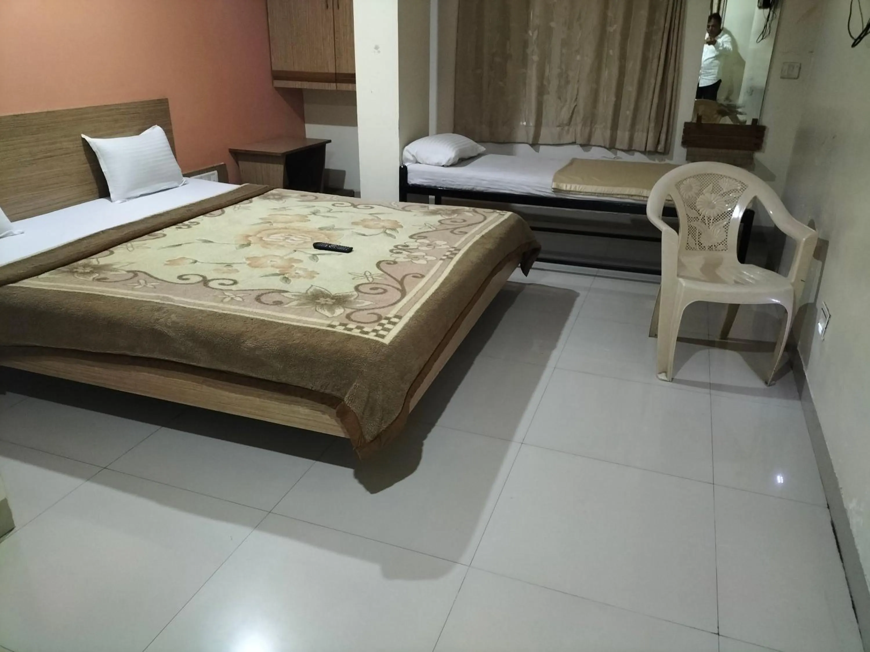 Photo of the whole room, Bed in HOTEL SAI SURYA