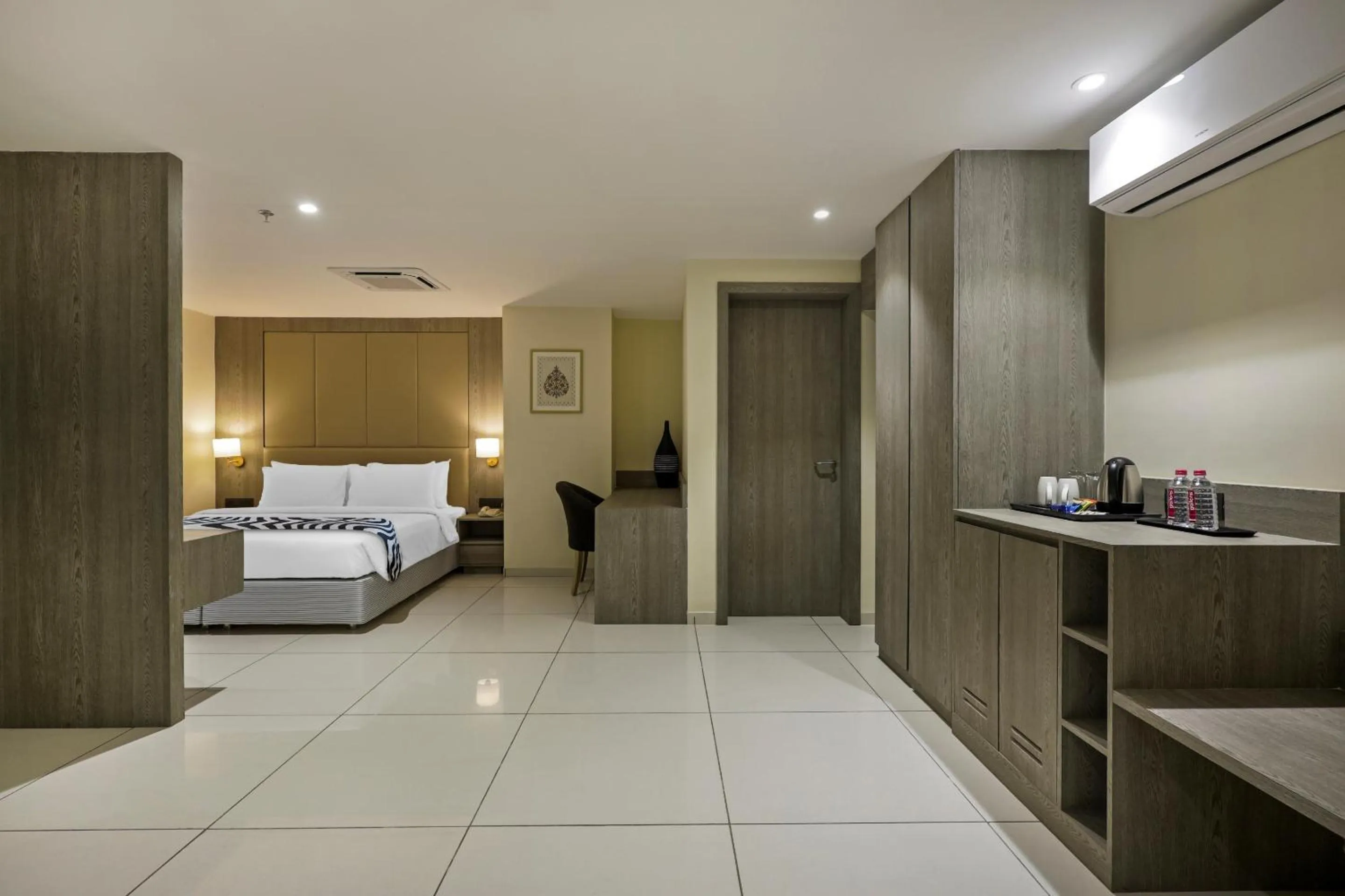 Bed in Sunday Hotel Vadodara