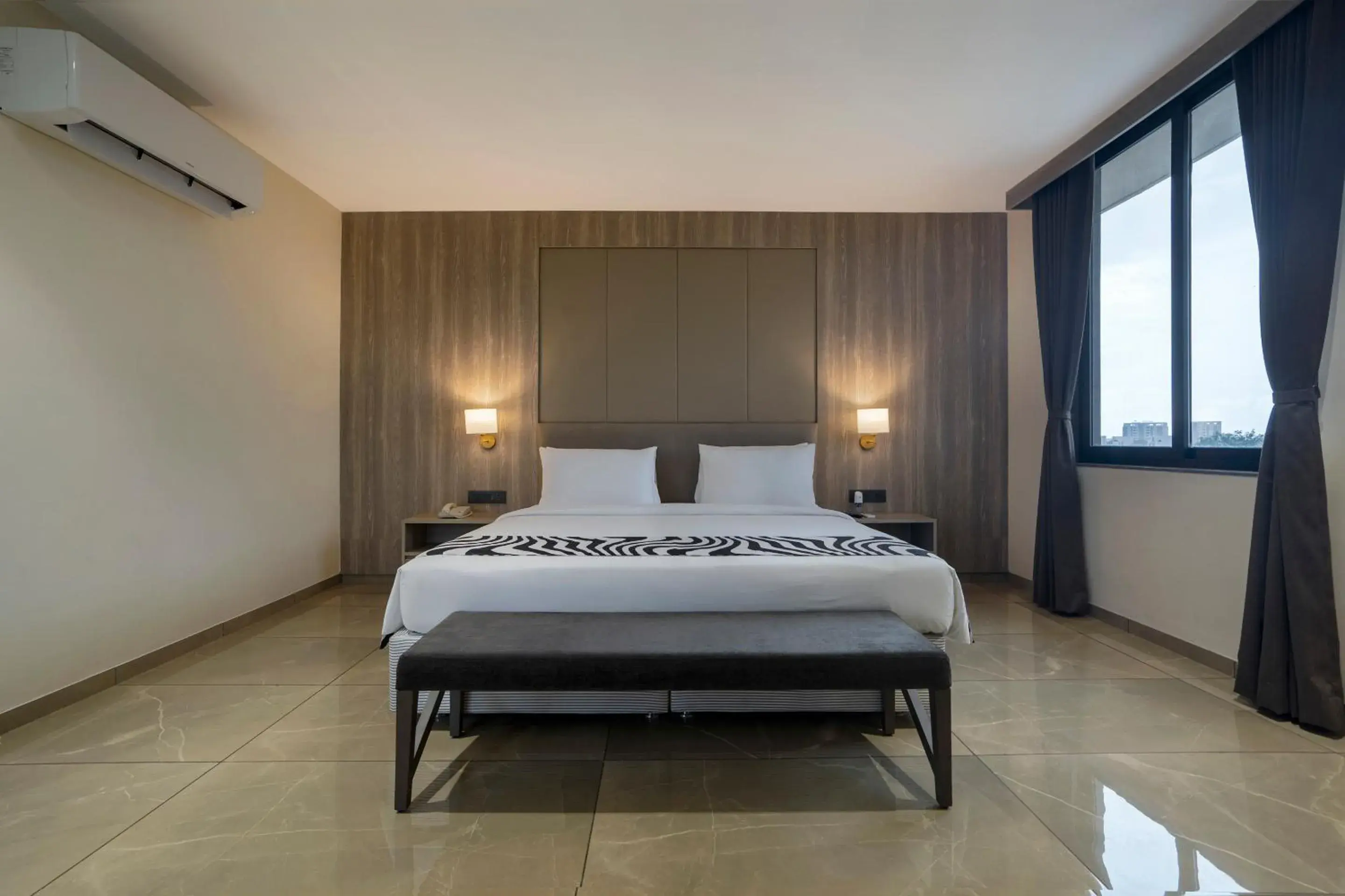 Deluxe Triple Room in Sunday Hotel Vadodara Deluxe Triple Room in Sunday Hotel Vadodara