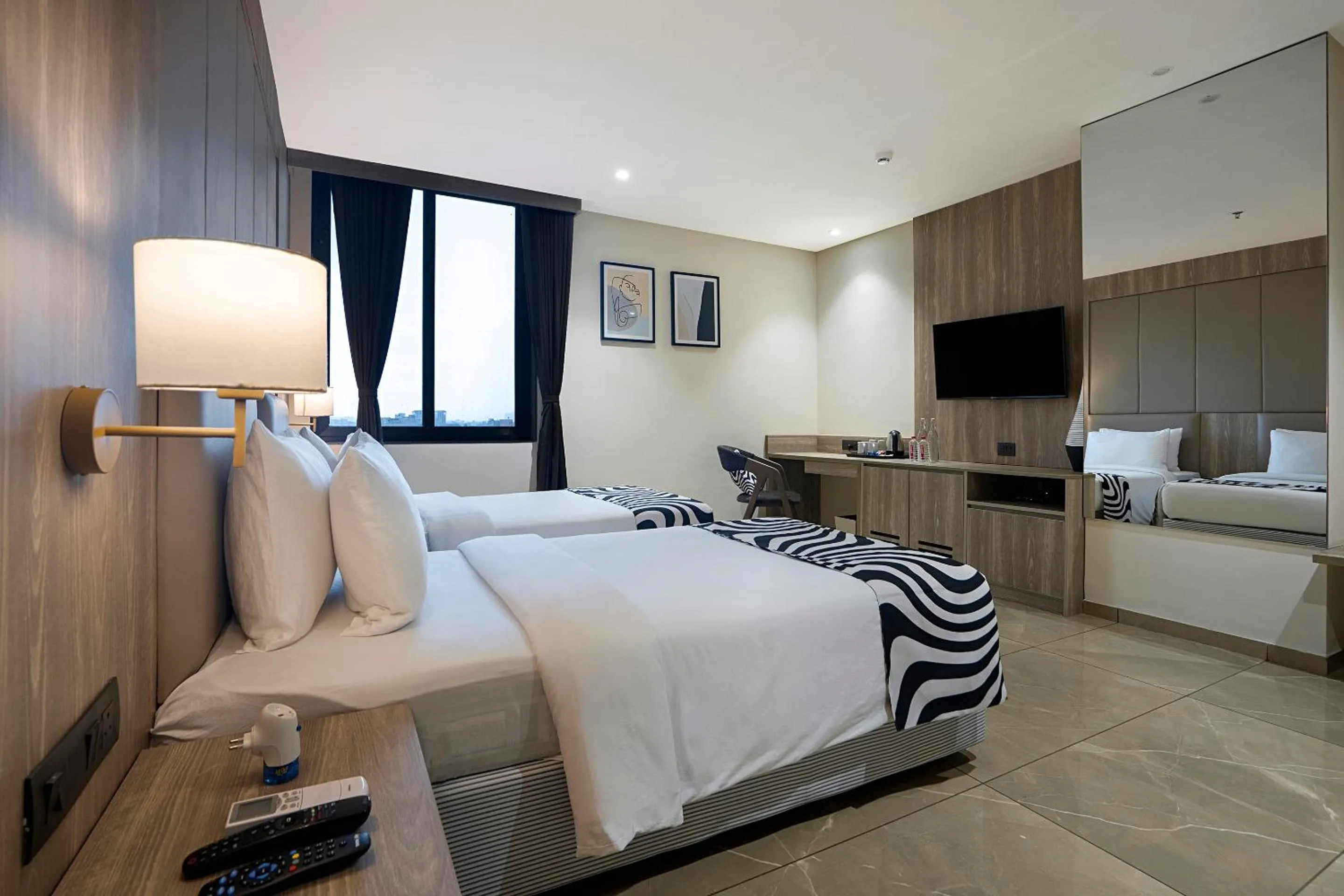 Photo of the whole room, Bed in Sunday Hotel Vadodara