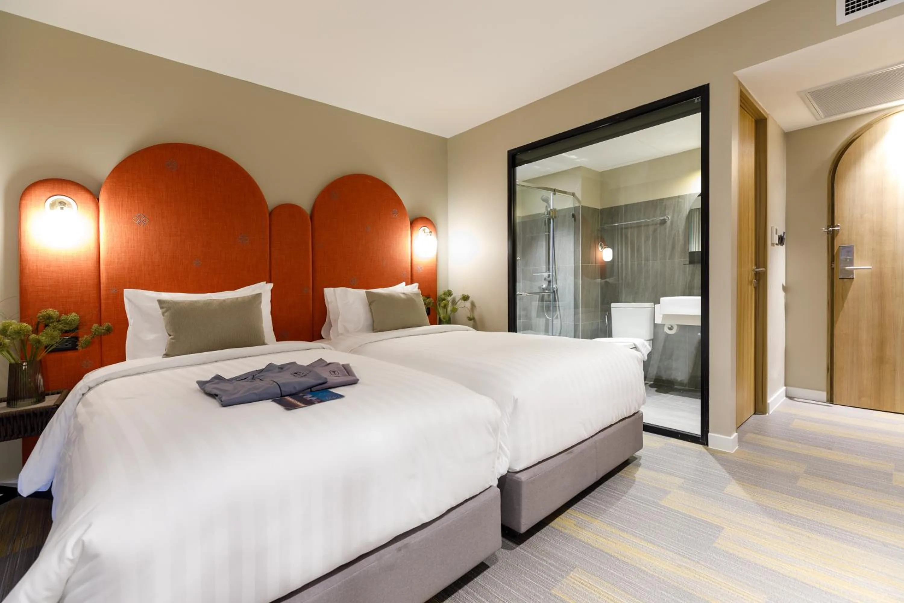 Bed in Benjarong Hotel Bangkok Ratchada