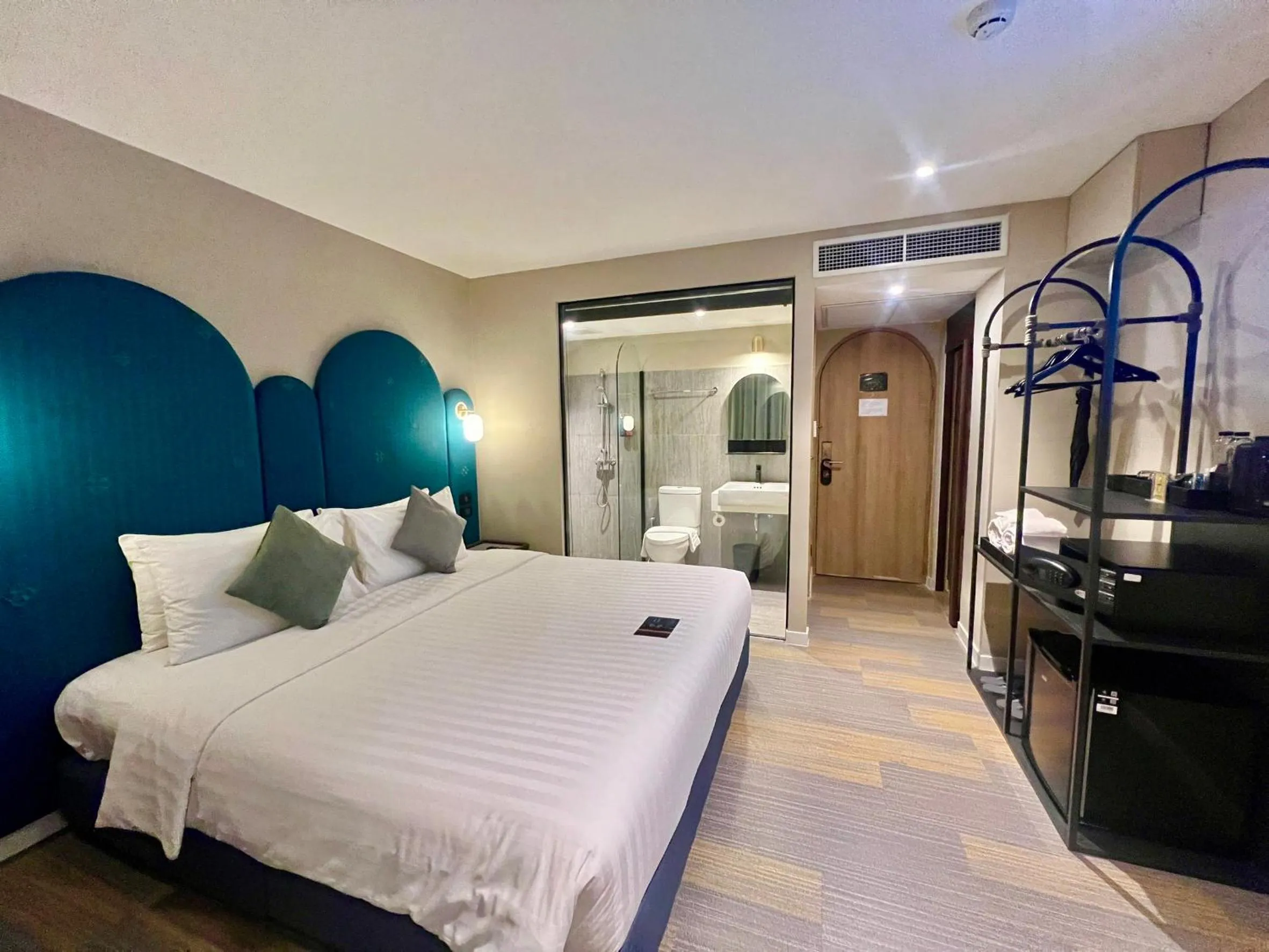 Bed in Benjarong Hotel Bangkok Ratchada