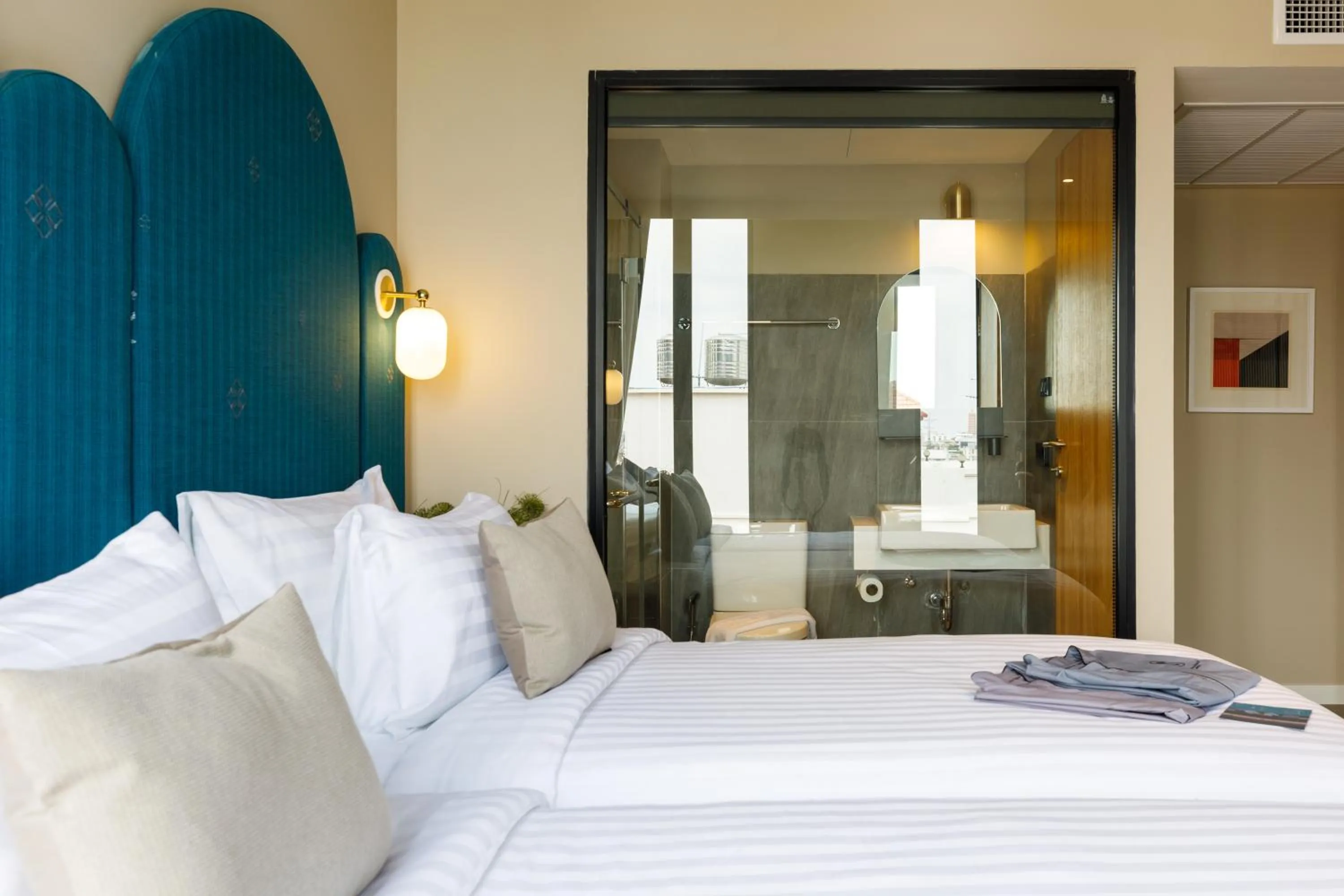 Bed in Benjarong Hotel Bangkok Ratchada