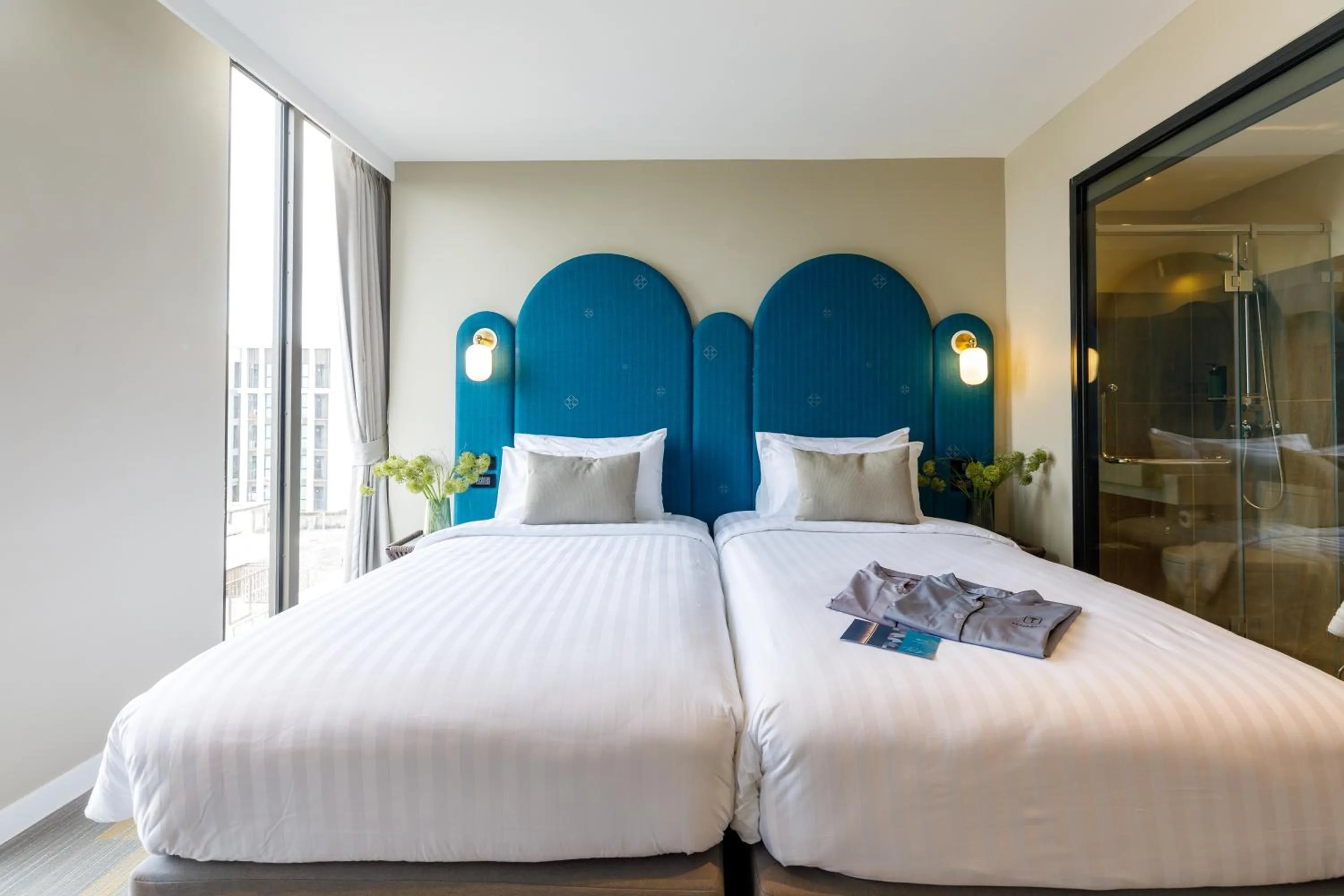 Bed in Benjarong Hotel Bangkok Ratchada