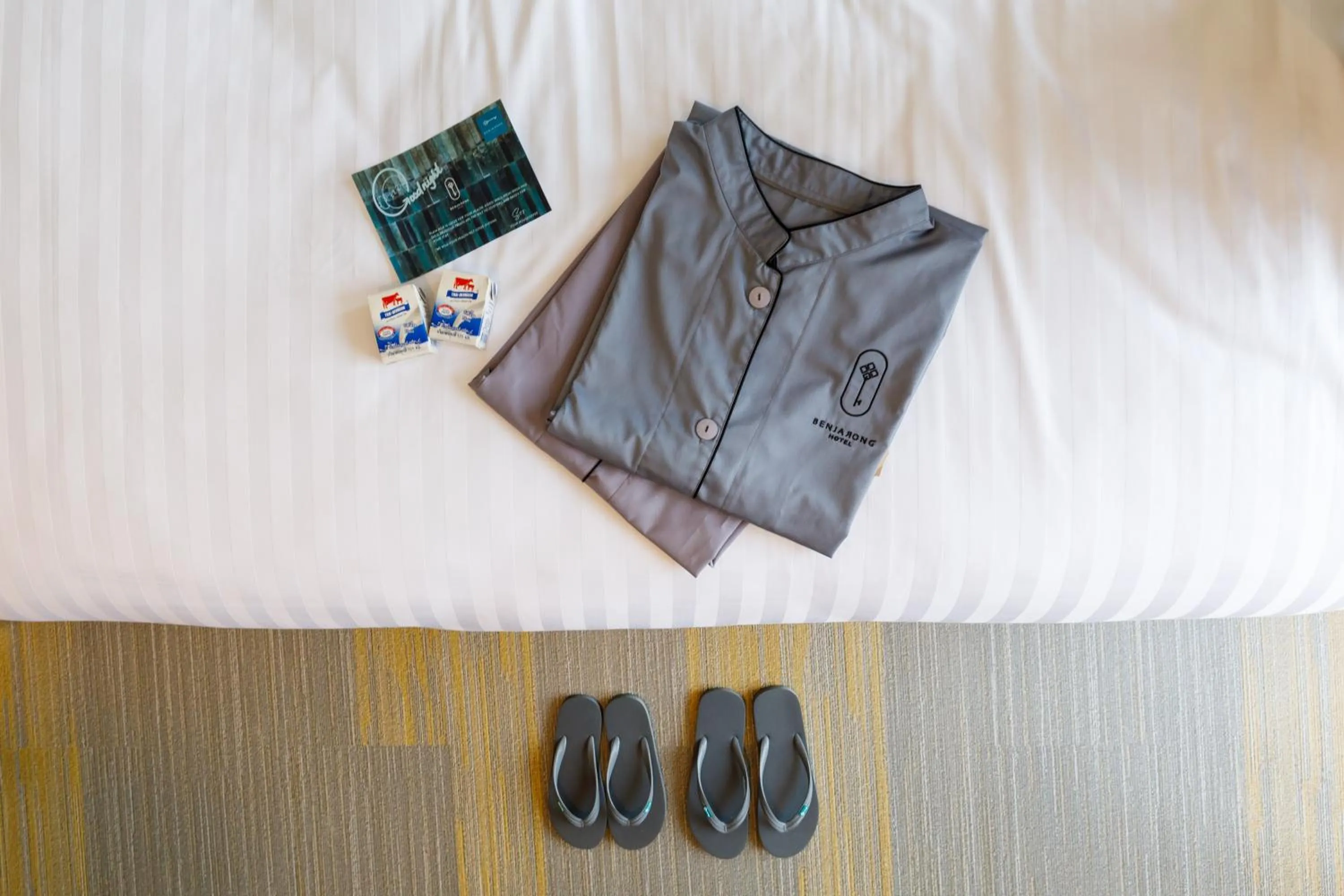 Bed in Benjarong Hotel Bangkok Ratchada