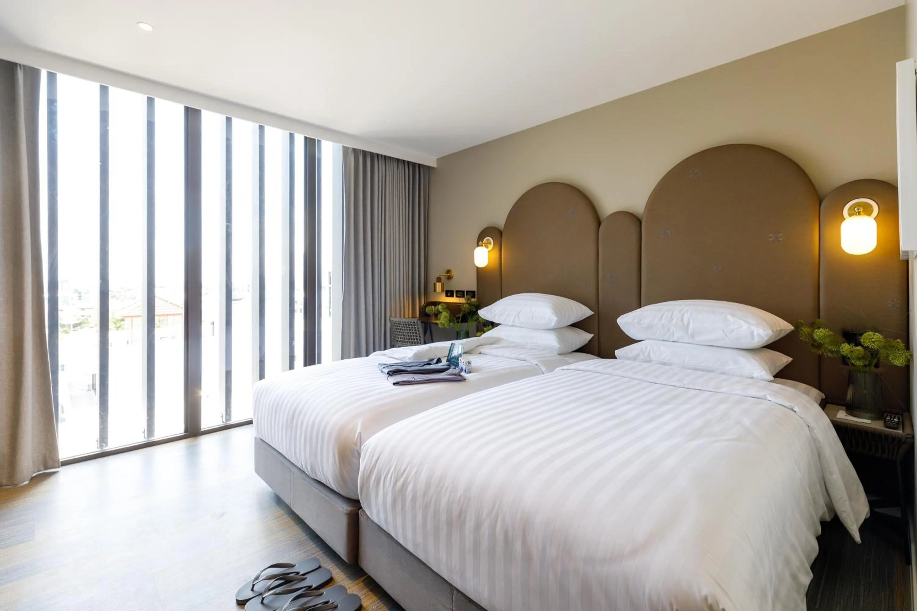 Bed in Benjarong Hotel Bangkok Ratchada